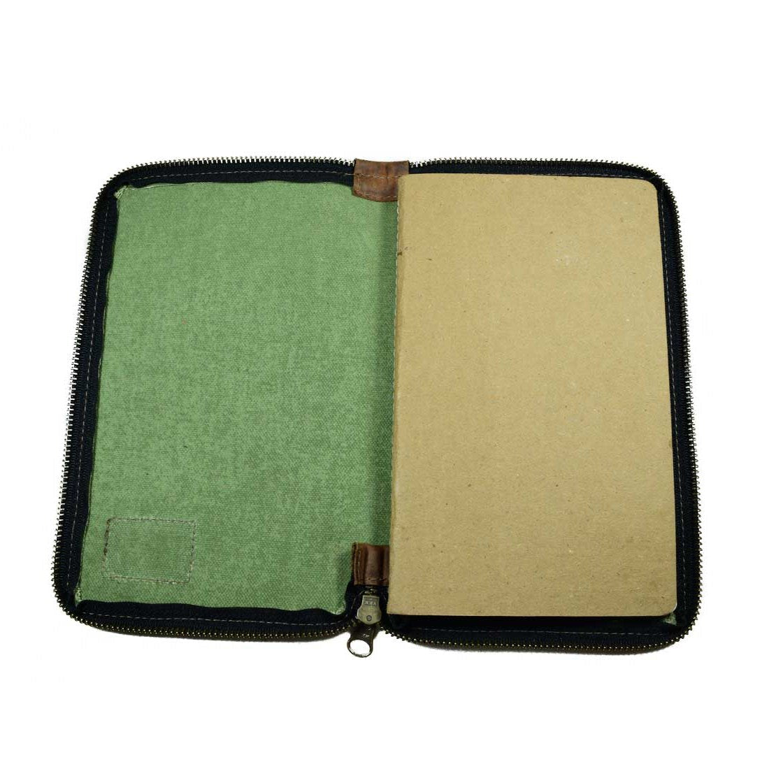 Inside pages of the Waxed Canvas Zippered Journal Cover for Moleskine (Notebook NOT Included) by Hide & Drink, showing blank lines ideal for writing. Perfect Cahier Case, featuring Full Grain Leather quality, handmade in La Antigua Guatemala & Oaxaca Mexico.