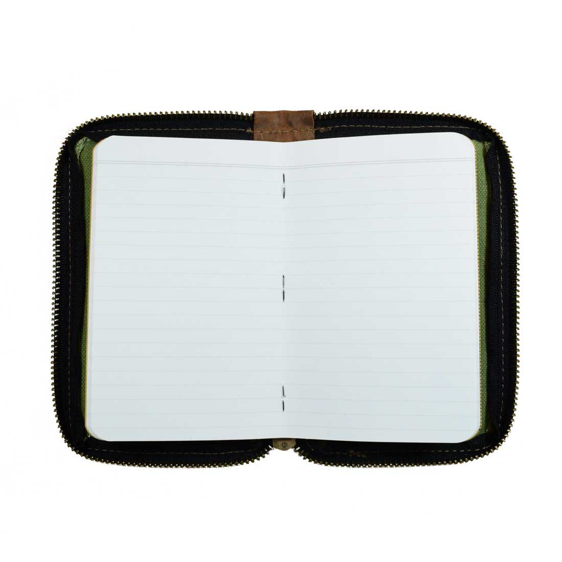 Blank pages of the Waxed Canvas Zippered Journal Cover for Moleskine (Notebook NOT Included) by Hide & Drink, ideal for creativity. Featured as a perfect Cahier Case made with Full Grain Leather by artisans in La Antigua Guatemala & Oaxaca Mexico.