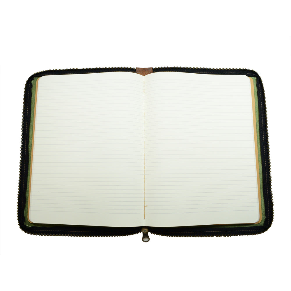 Blank lined pages inside the Waxed Canvas Zippered Journal Cover for Moleskine (Notebook NOT Included) by Hide & Drink, ready for notes and sketches. A stylish Cahier Case made from premium Full Grain Leather and handcrafted in La Antigua Guatemala & Oaxaca Mexico.