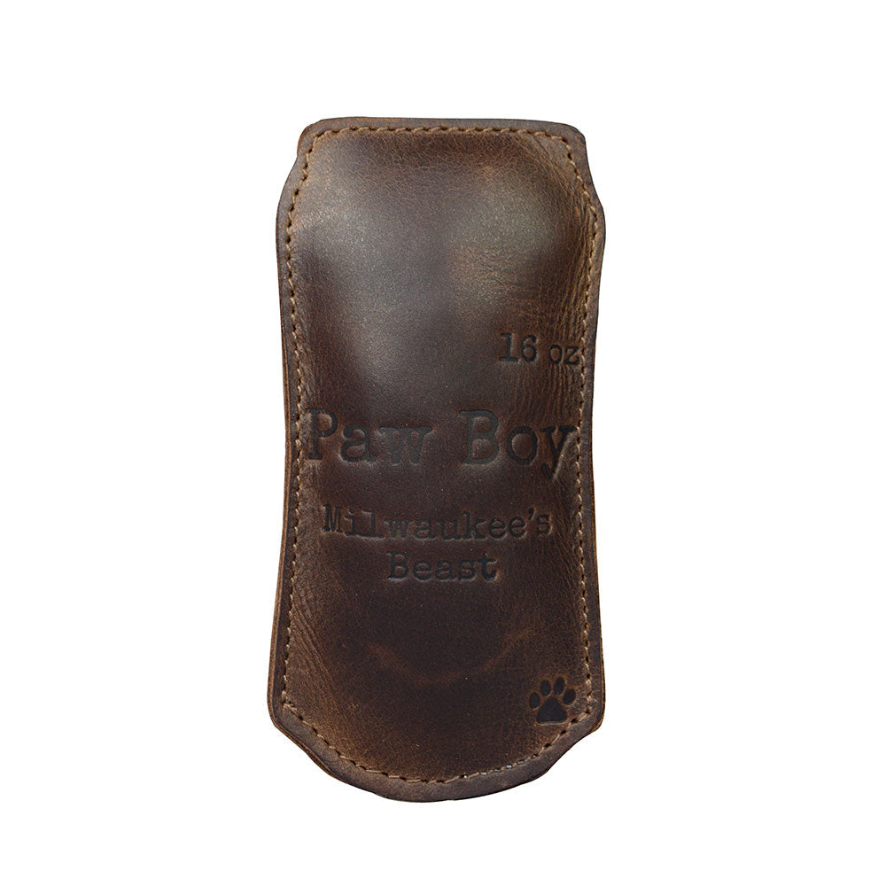 Chew Toy for Dogs Drinking Theme by Hide & Drink presents the 'Paw Boy' leather chew toy, providing endless fun for dogs. This high-quality chew toy is made from durable full grain leather, handcrafted through small batch production and showcasing hand cut, hand sewn, and fire branded artistry in La Antigua Guatemala & Oaxaca Mexico.