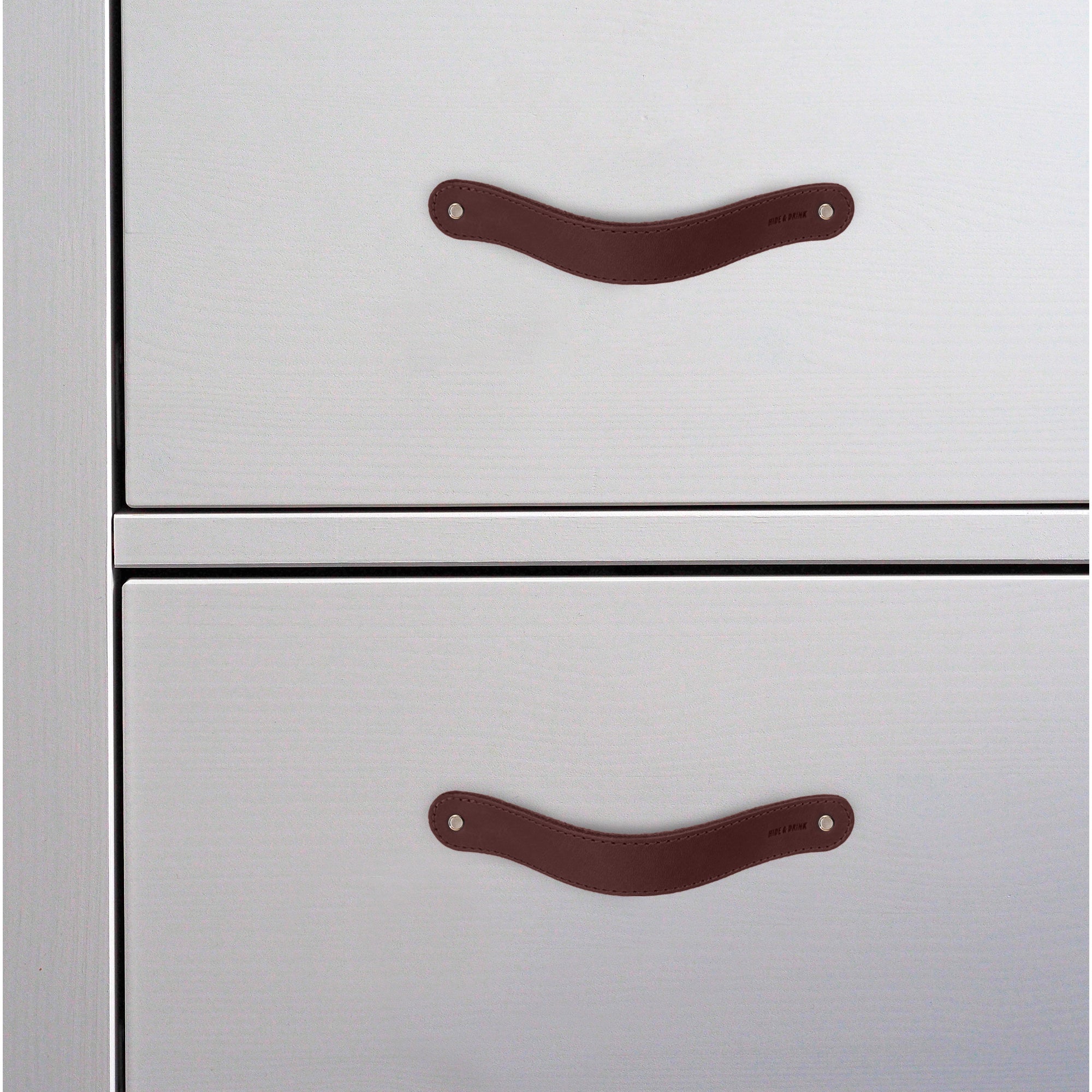 Hide & Drink Drawer Handles (4pk) presenting a selection of durable leather handles in various textures, each easy to install. Artisan crafted for a stylish enhancement to any furniture.