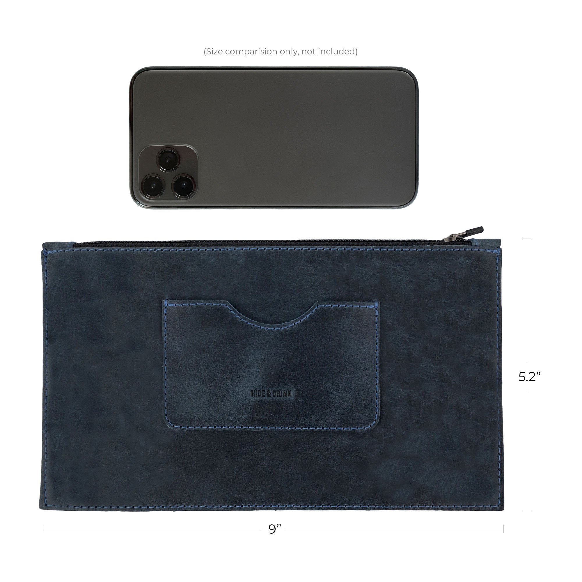 A dark brown rectangular zippered handbag by Hide & Drink next to leather care tags, representing quality and elegance for women. This full grain leather female purse features a card slot, showcasing artisan craftsmanship and small batch production characteristics, handcrafted in La Antigua Guatemala & Oaxaca Mexico.