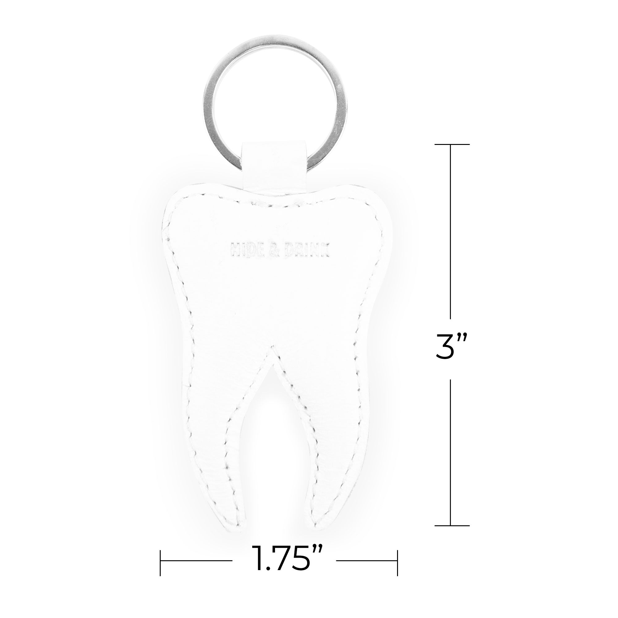 Dimensions of the Tooth Keychain by Hide & Drink, illustrating its size of 1.75" x 3". This Tooth Leather Keychain is an adorable and functional key ring, perfect for dental professionals and dentist gifts. Made from full grain leather, it emphasizes artisan craftsmanship, small batch production, hand cut, hand sewn, and fire branded quality from La Antigua Guatemala & Oaxaca Mexico.
