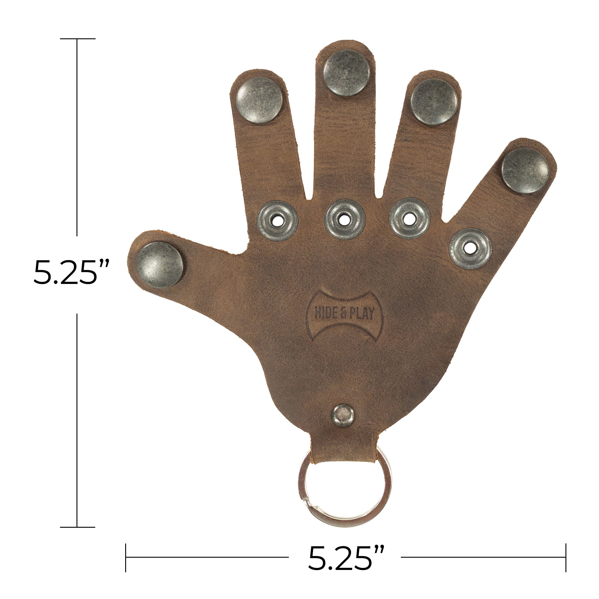 A detailed view of a Hand Keychain by Hide & Play, highlighting its full grain leather craftsmanship in a hand shape design. This durable Full Grain Leather Hand Shape Keychain acts as a keyring and key holder. Each piece is an artisan's creation made in La Antigua Guatemala & Oaxaca Mexico, emphasizing hand cut and hand sewn excellence.