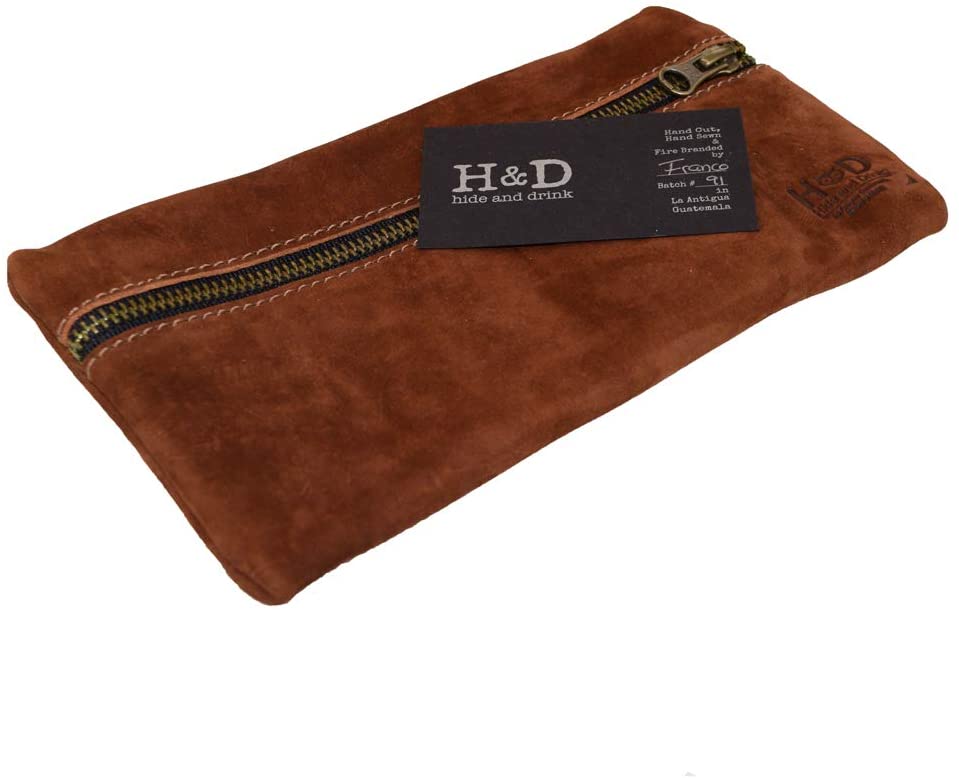 Hide & Drink Utility Cord Pouch shown with inner contents visible, emphasizing functionality and style. A practical all-purpose utility & charger case for MacBook, iPad & Laptop, it also serves as a lightweight cable organizer for travel, handcrafted in La Antigua Guatemala & Oaxaca Mexico.