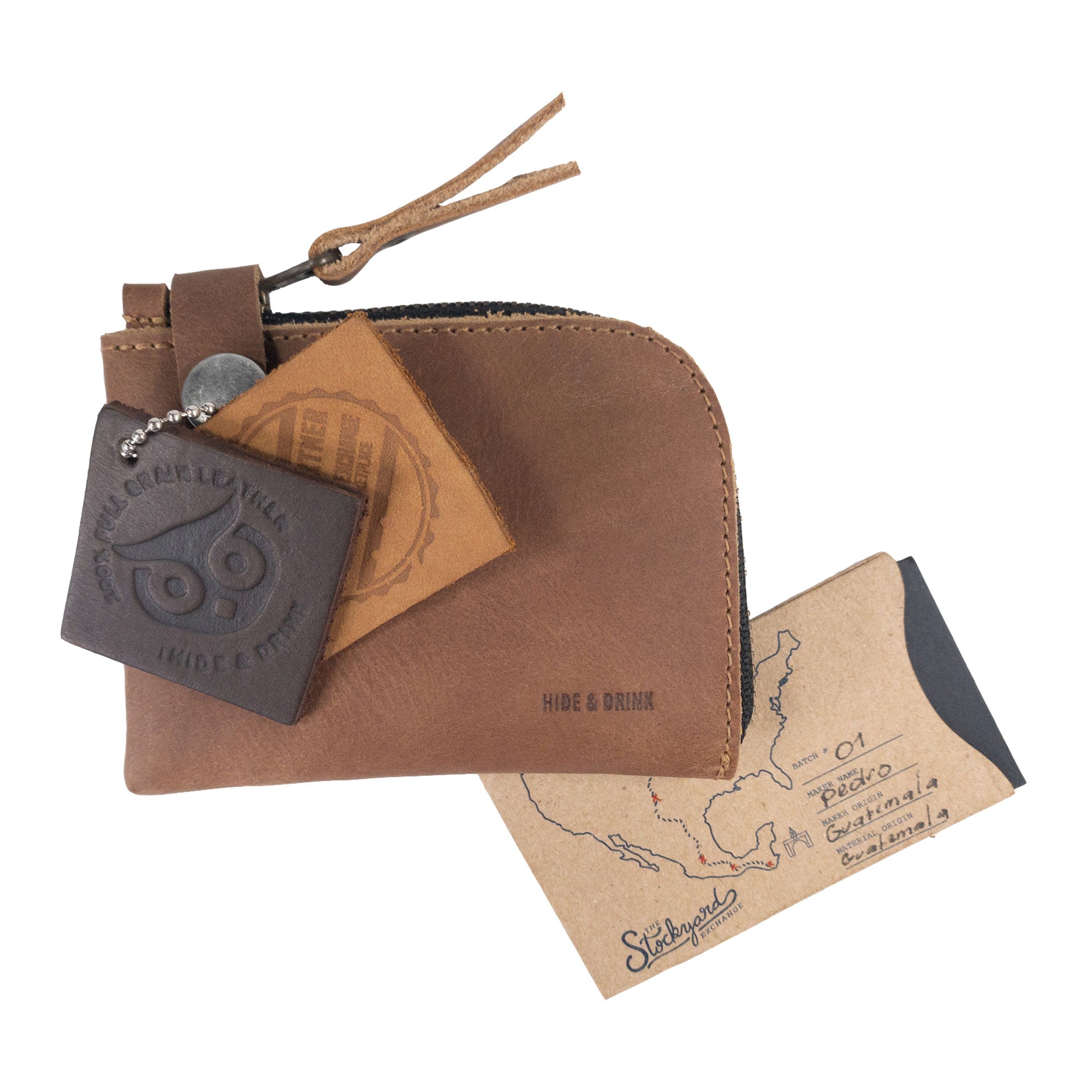 Unique patina and full grain leather finish of the Lion's Mane Zippered Wallet by Hide & Drink, perfect for those seeking durability and style.