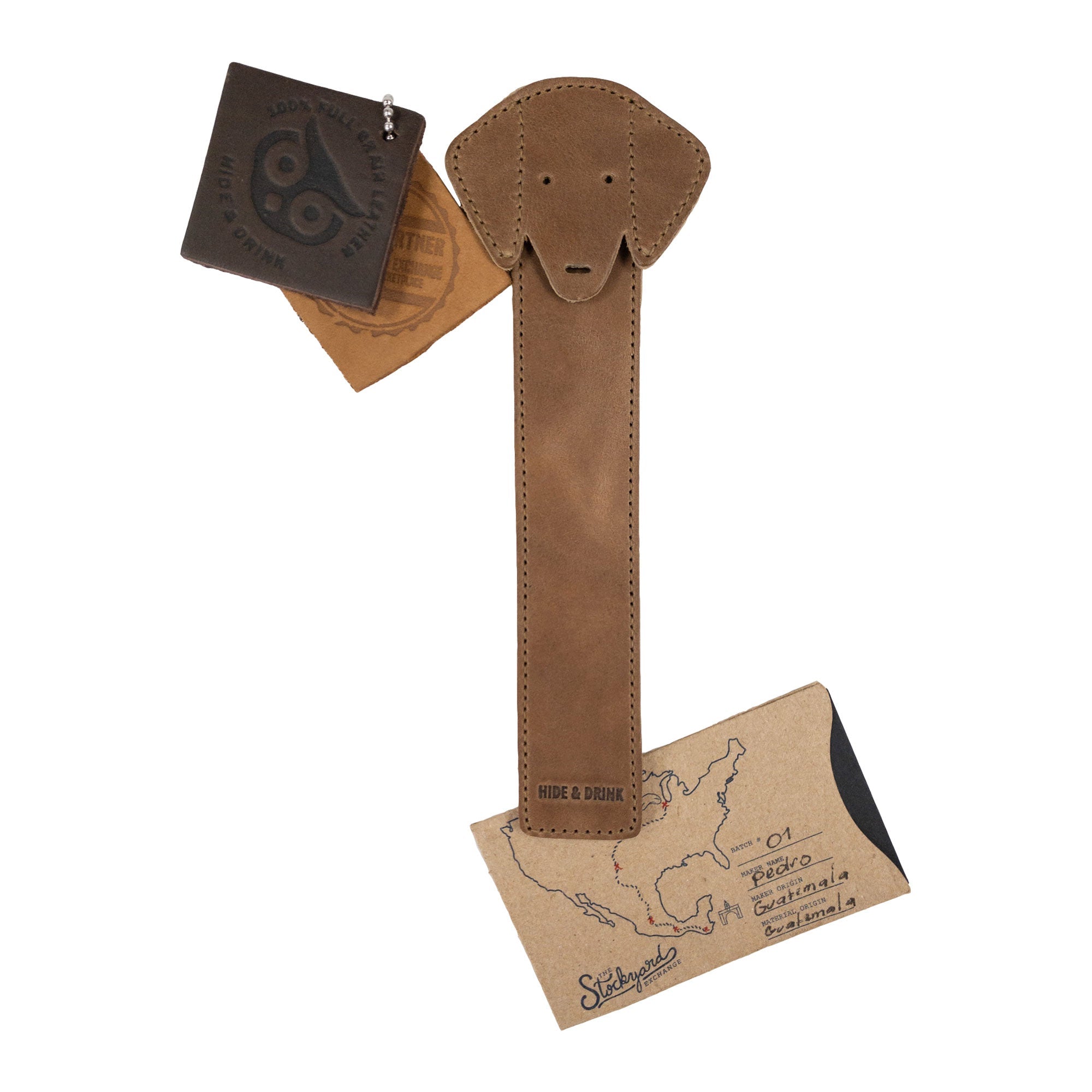 The back of Hide & Drink's brown Dog Bookmark, emphasizing its Full Grain Leather composition. This artisan bookmark reflects the true essence of small batch production and fire branding, proudly made in La Antigua Guatemala & Oaxaca Mexico.