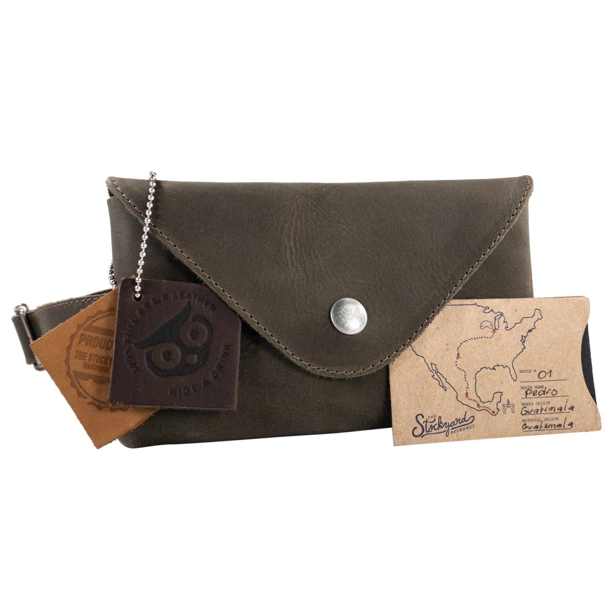 Hide & Drink's Fancy Fanny Pack with artisan branding tags, showcasing quality craftsmanship. This full grain leather waist pouch merges function and style, suitable for a vintage purse and ideal for travel.