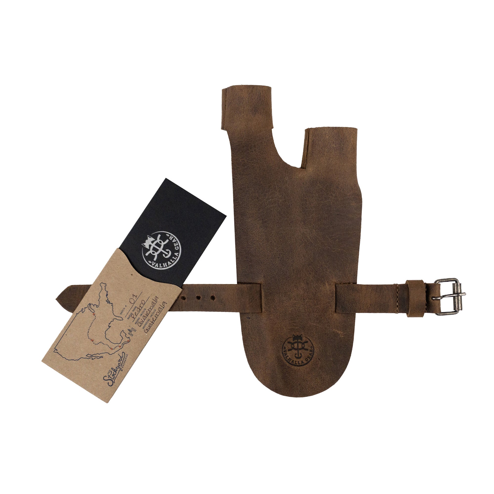The Valhalla Gear Archery Shooting Glove alongside its packaging, showcasing the artisan quality and craftsmanship. This glove, made from Full Grain Leather, is perfect for archers looking for a Hand Guard and Wrist and Finger Protector for using a Recurve Bow. Ideal for shooting sports or cosplay, it embodies handmade excellence from La Antigua Guatemala.