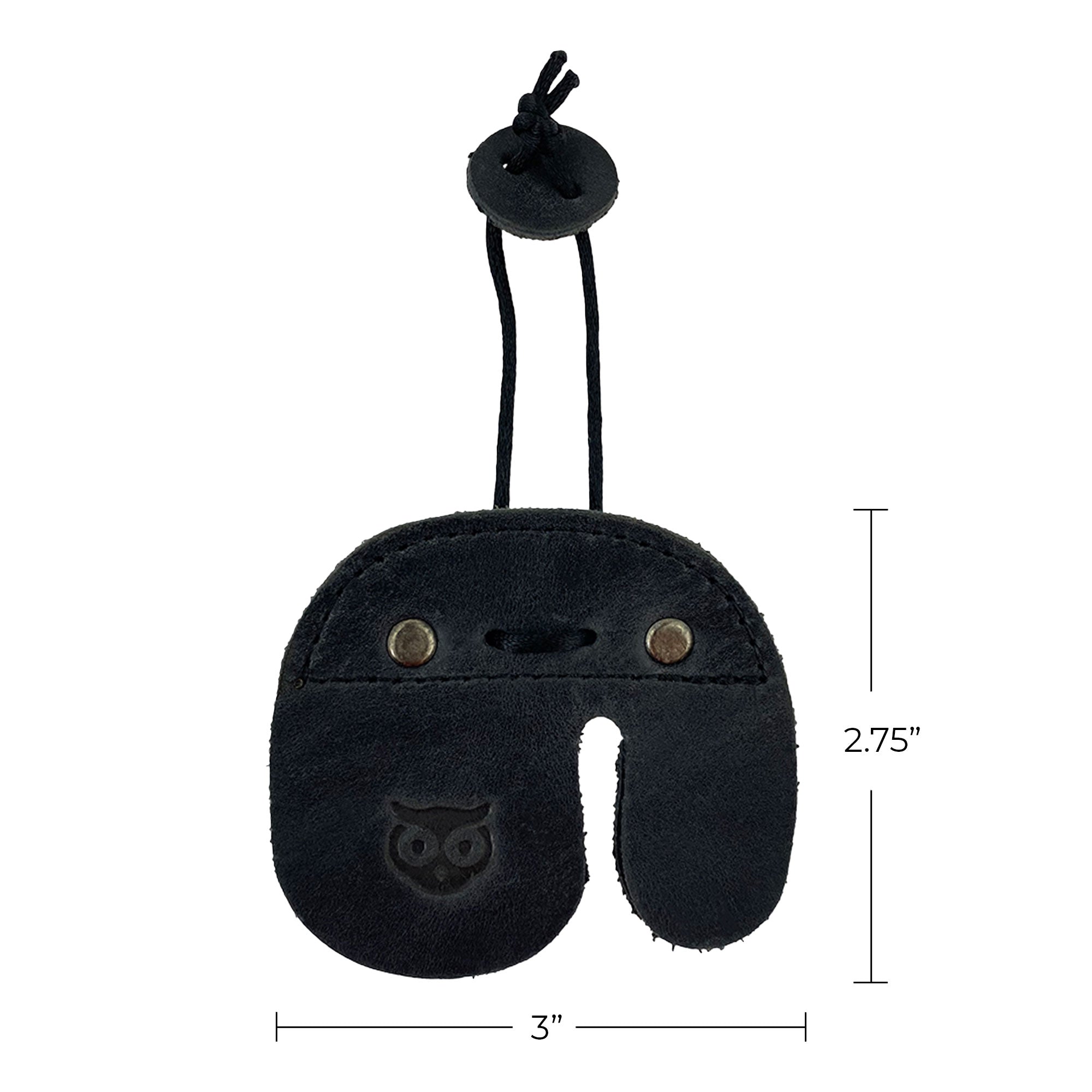 The Hide & Drink Left Handed Archery Finger Protector in a detailed close-up view, highlighting its craftsmanship. This Archery Finger Tab is a protect guard for recurve bows, made from exquisite Full Grain Leather. Enhance your shooting practice gear with this artisan piece, where small batch production meets quality from StockyardX.