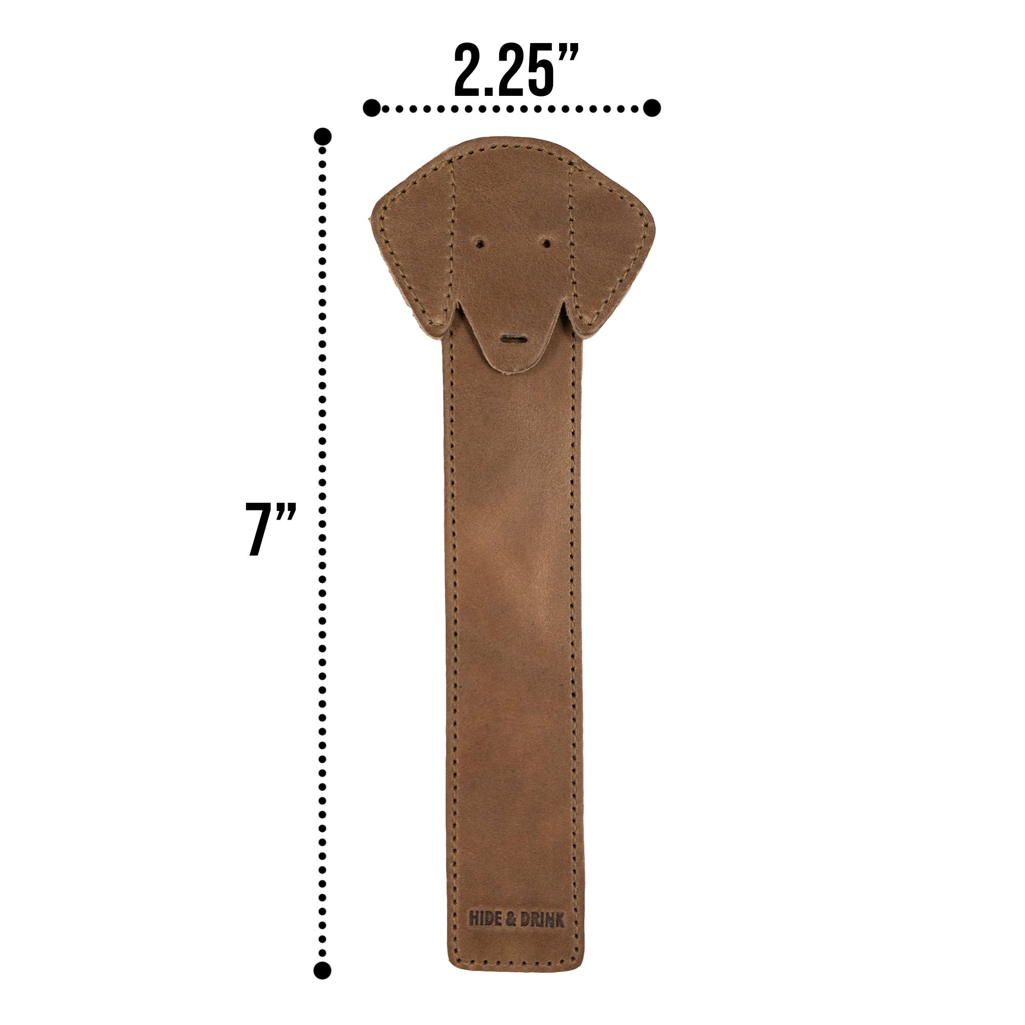 The front view of Hide & Drink's brown Dog Bookmark made from Full Grain Leather, showcasing a smiling dog design. This handmade bookmark highlights the spirit of small batch production and fire branding, crafted in La Antigua Guatemala & Oaxaca Mexico.