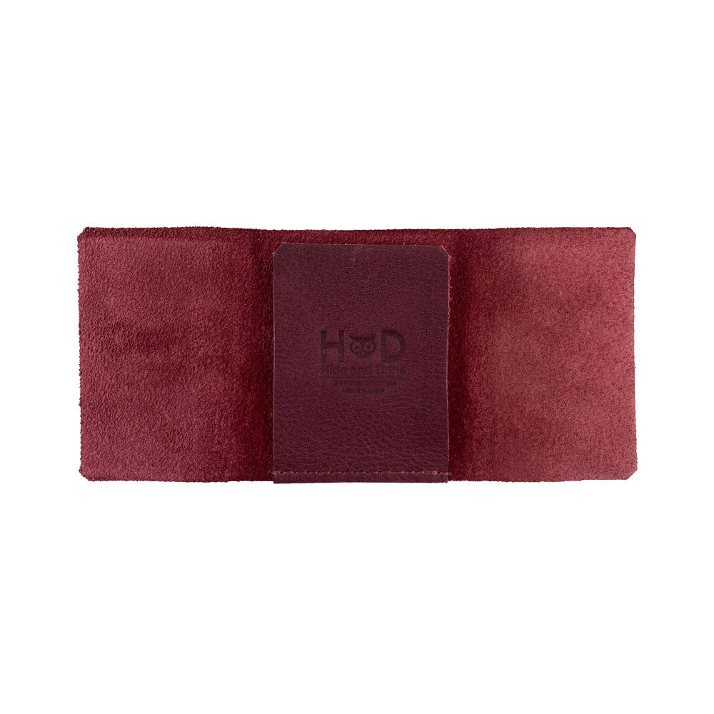 The Hide & Drink Minimalist Wallet Bills Only presented elegantly to reveal its functionality. This Ultra Minimalist Wallet is crafted from quality Full Grain Leather, providing a reliable cash organizer reflecting the artisan craftsmanship through small batch production.