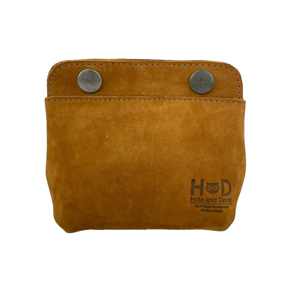 Front view of Hide & Drink Double Snap Pouch in rich brown suede, suitable for cash, coins, and small items. This full grain leather coin purse reflects artisan craftsmanship from La Antigua Guatemala.