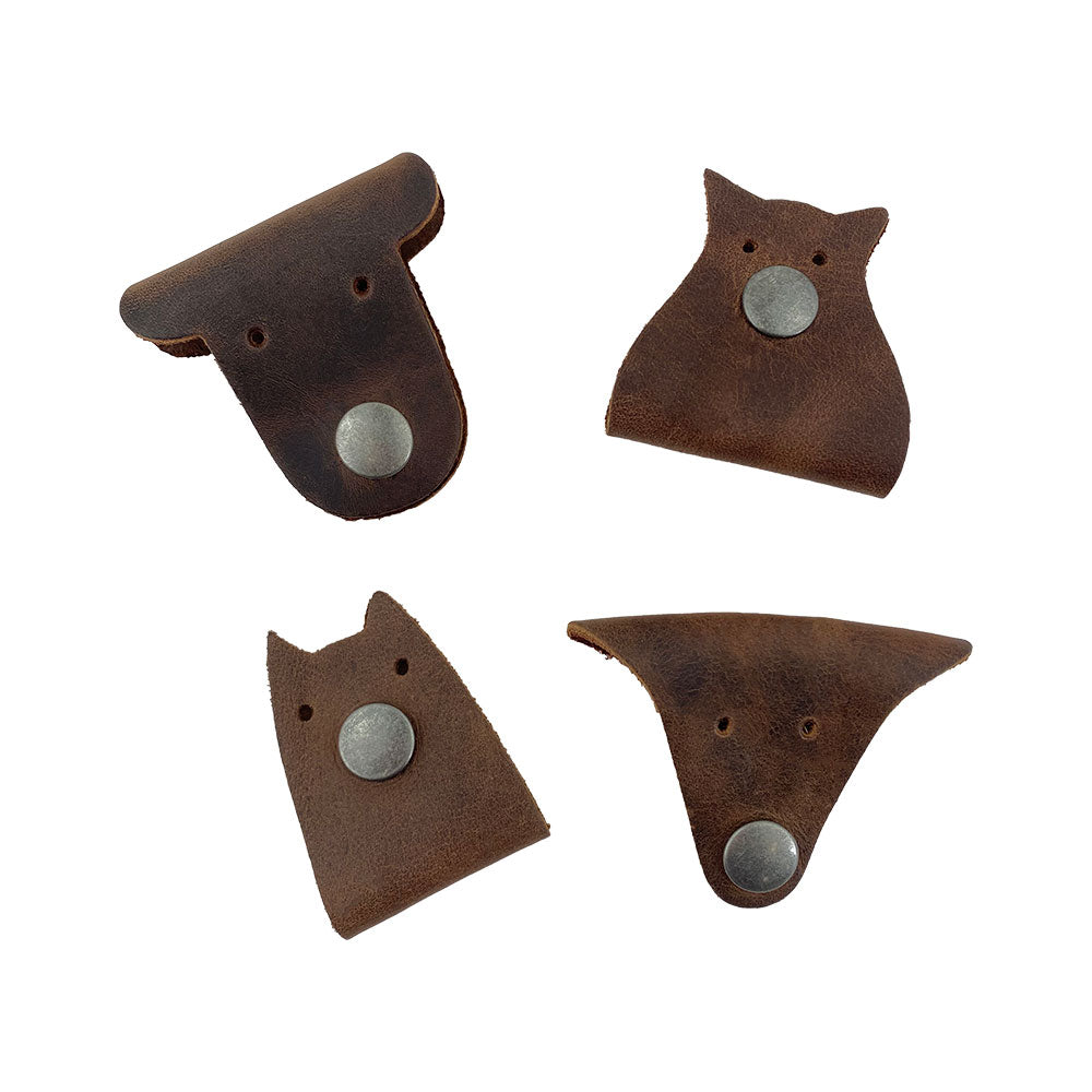Furry Friends Cord Keeper (4-Pack) featuring cute designs for cord organization, made with high-quality Full Grain Leather by Hide & Drink. Furry Friends 4-Pack Cord Keeper (Cord Clam), Full Grain Leather, StockyardX, Small Batch Production, Hand Cut, Hand Sewn, Fire Branded, Artisan, Handmade in La Antigua Guatemala & Oaxaca Mexico.