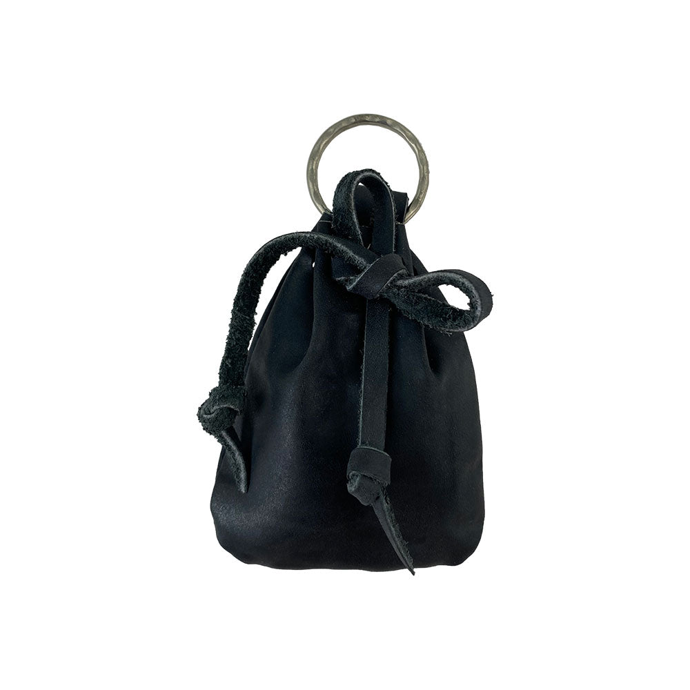 A Mini Medieval Pouch Keychain from Hide & Drink in black leather, showing its unique design. This tiny bag with keyring expertly serves as a coin organizer, showcasing the artisan craftsmanship rooted in small batch production from La Antigua Guatemala.