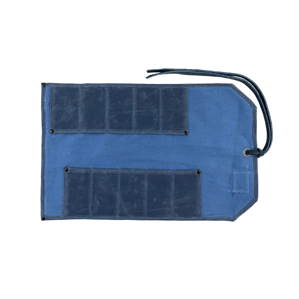 Hide & Drink Tool Roll presents a sophisticated small tool roll-up bag with 10 slots, made from high-quality full grain leather. This portable carry-on pouch excels in organizing woodworking tools and enhancing workshop storage. Each artisanal product is carefully handmade in La Antigua Guatemala & Oaxaca Mexico.