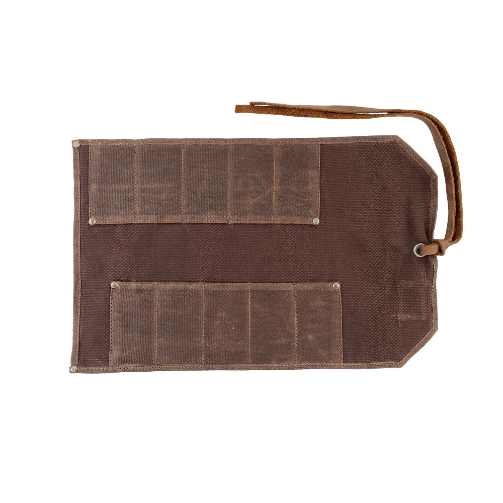 Hide & Drink Tool Roll showcases a trendy small tool roll-up bag with 10 slots, made from quality full grain leather. Perfectly designed as a portable carry-on pouch for woodworking tools, it improves your workshop storage experience. Authentic artisan craftsmanship is reflected in each handmade item from La Antigua Guatemala & Oaxaca Mexico.