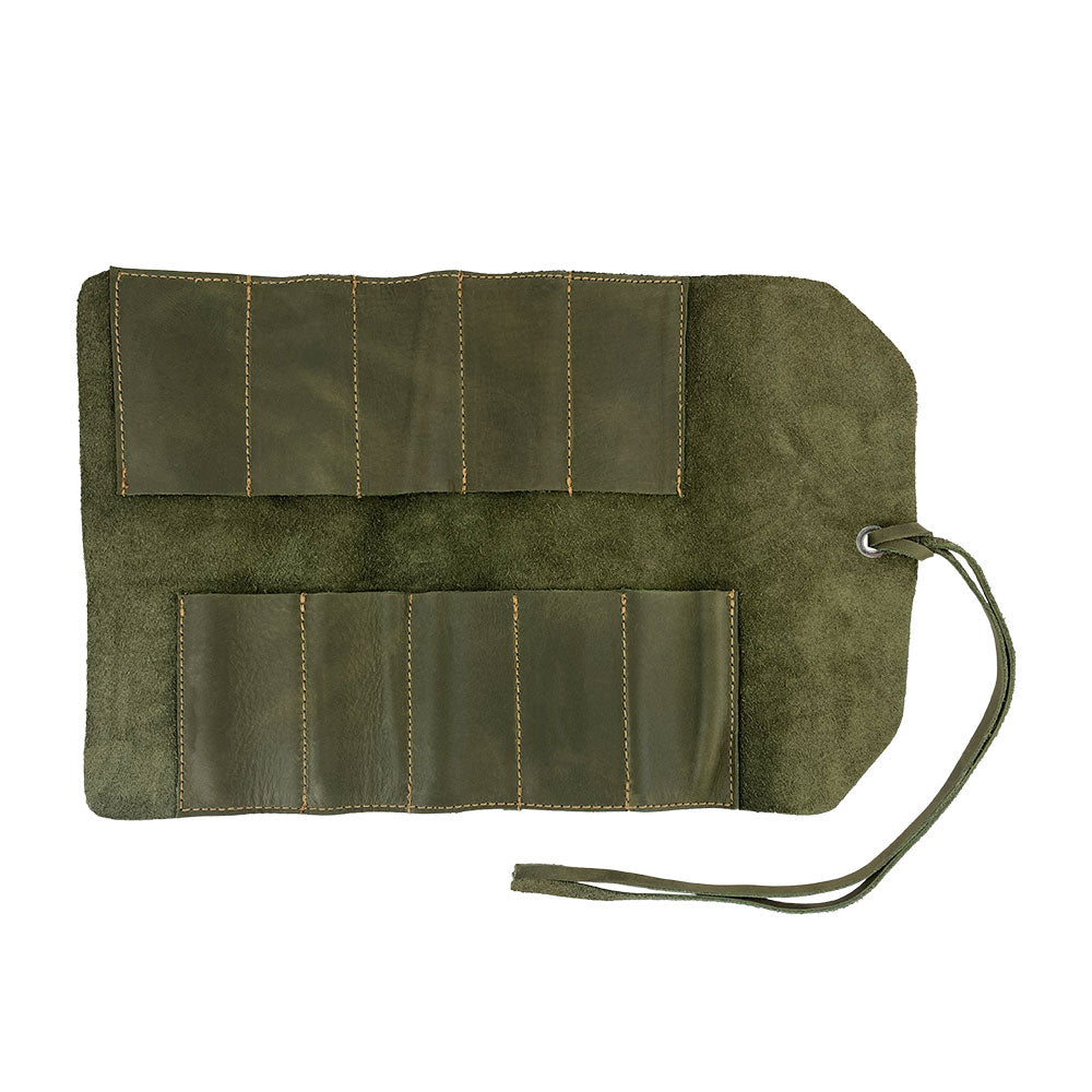 Hide & Drink Tool Roll displays a functional small tool roll-up bag with 10 slots, crafted from durable full grain leather. This portable carry-on pouch is essential for woodworking tools organization at your workshop, promoting effective storage solutions. Hand cut and sewn in La Antigua Guatemala & Oaxaca Mexico, each piece shows artisan quality.