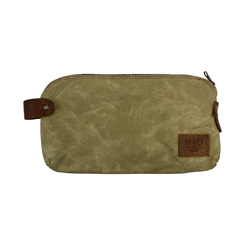 Dopp Kit Utility Bag by Hide & Drink featuring a practical leather design ideal for organized travel. This large rustic all-purpose Dopp Kit Utility Bag is handmade from full grain leather reflecting artisan craftsmanship with hand cut and hand sewn details, handmade in La Antigua Guatemala & Oaxaca Mexico.