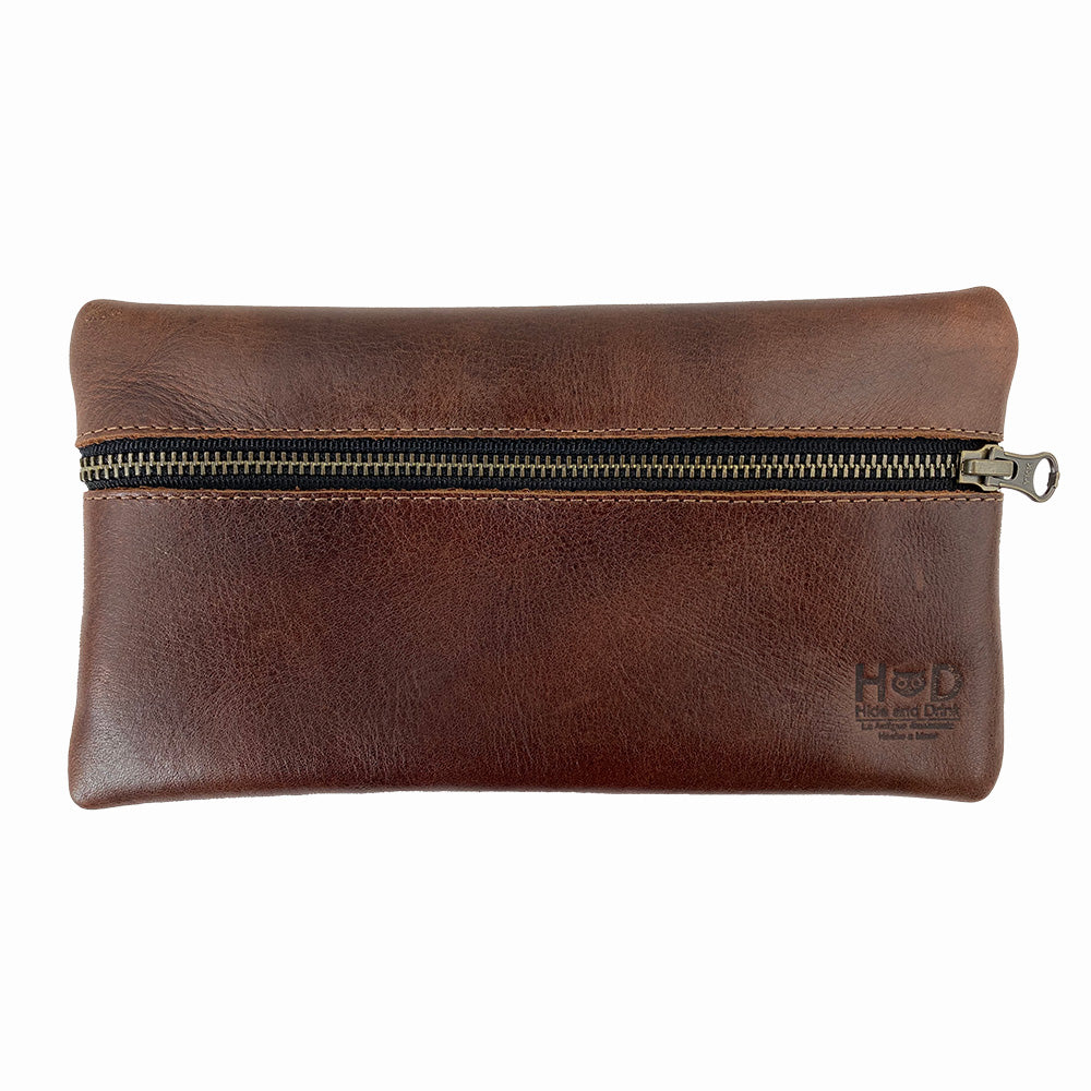 Hide & Drink Utility Cord Pouch in a sleek format, showcasing its practicality as a must-have accessory. This all-purpose utility & charger case for MacBook, iPad & Laptop also doubles as a sleek cable organizer, presenting quality craftsmanship from La Antigua Guatemala & Oaxaca Mexico.