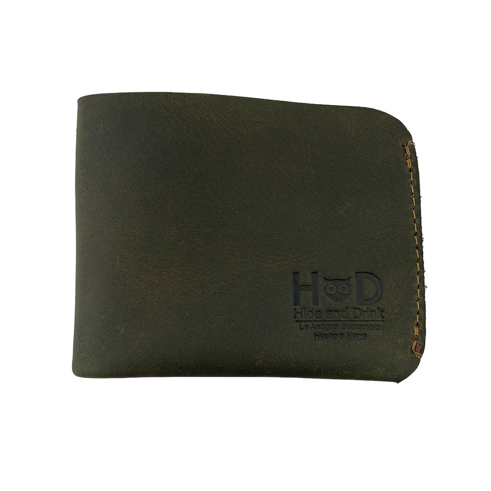 Front view of the Hide & Drink Minimal Wallet in dark green, made from Full Grain Leather. This Classic Slimfold Wallet offers a refined Card Organizer Holder experience, representing a Travel Accessory that showcases Small Batch Production craftsmanship from artisans in La Antigua Guatemala & Oaxaca Mexico.