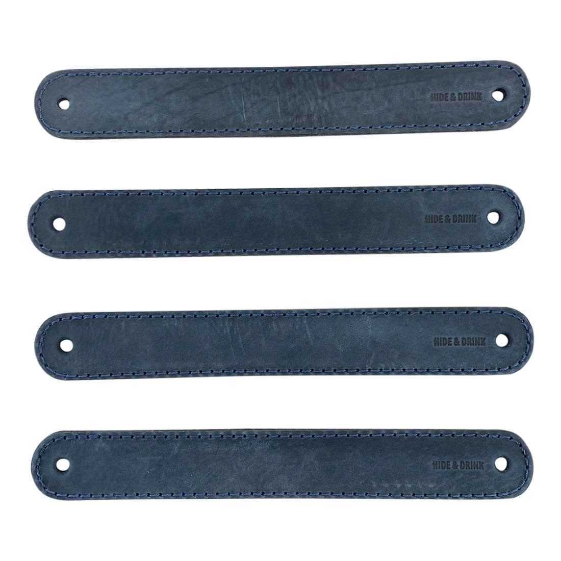Hide & Drink Drawer Handles (4pk) showcasing a lighter shade of leather handles, demonstrating quality craftsmanship. Each durable handle is easy to install with pre-made holes, ideal for home decor.