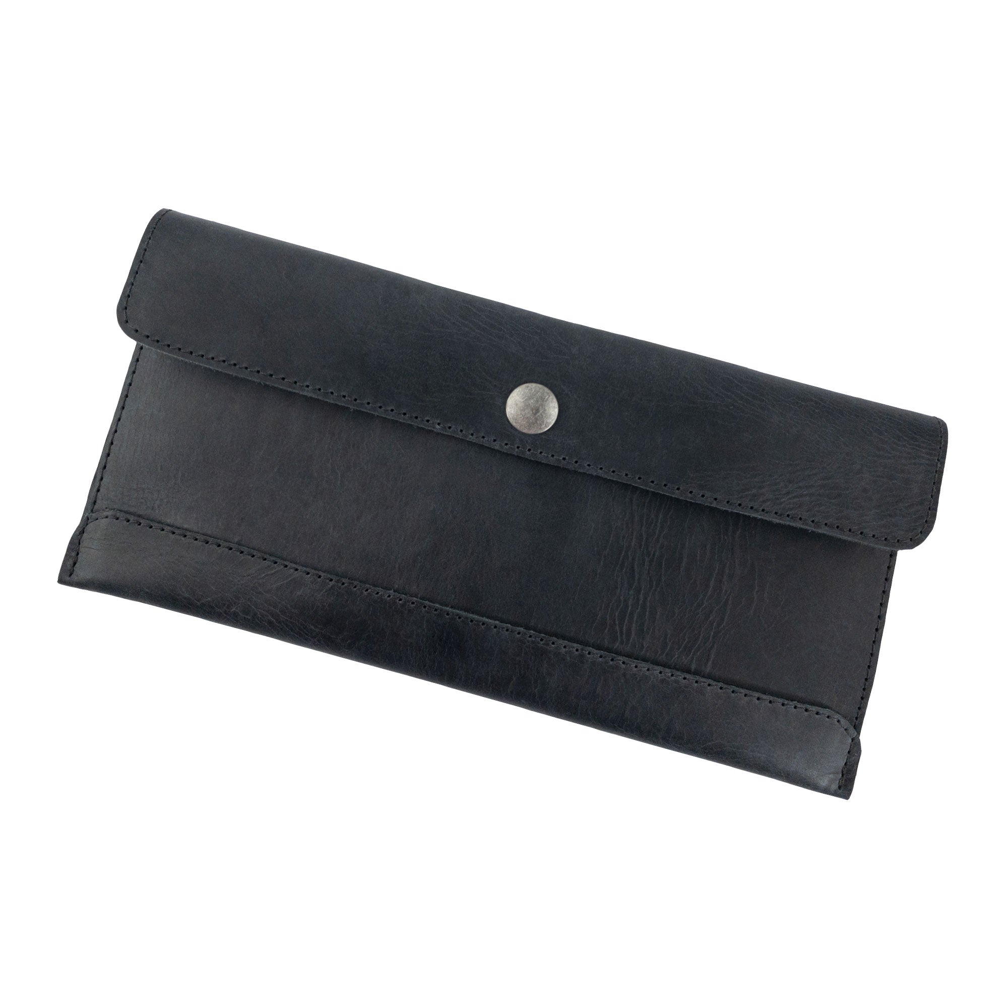Hide & Drink's black Travel Hand Wallet featuring a classic closure, made from high-quality Full Grain Leather. This Travel Wallet exemplifies artisan craftsmanship through Small Batch Production in La Antigua Guatemala & Oaxaca Mexico.