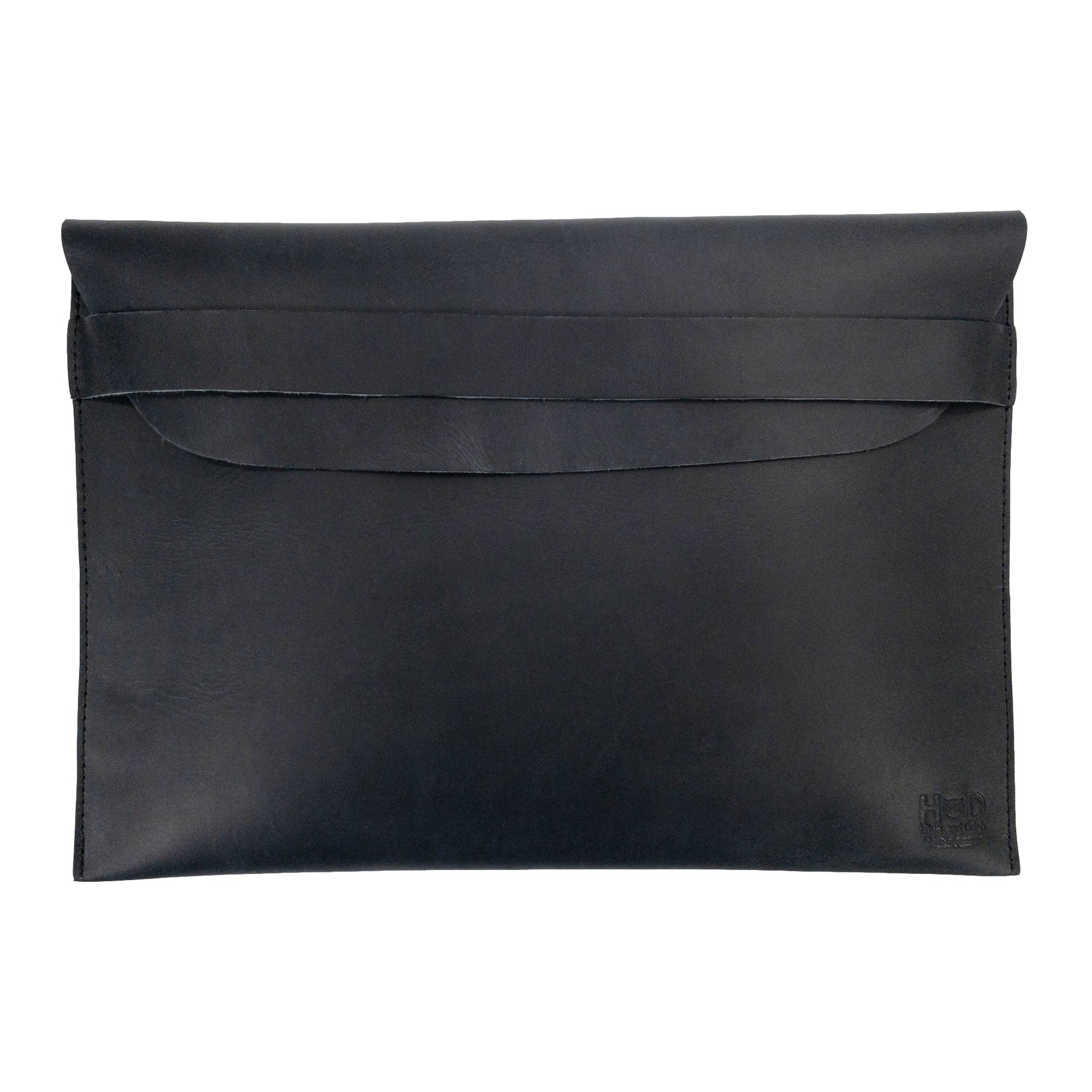 Sleek design of the Hide & Drink MacBook Slim Case in black, showcasing its fine full grain leather texture. Perfect for MacBook Air/Pro 13 Inch with M1 Chip, this artisan case highlights hand cut, hand sewn quality and is lovingly crafted in La Antigua Guatemala.