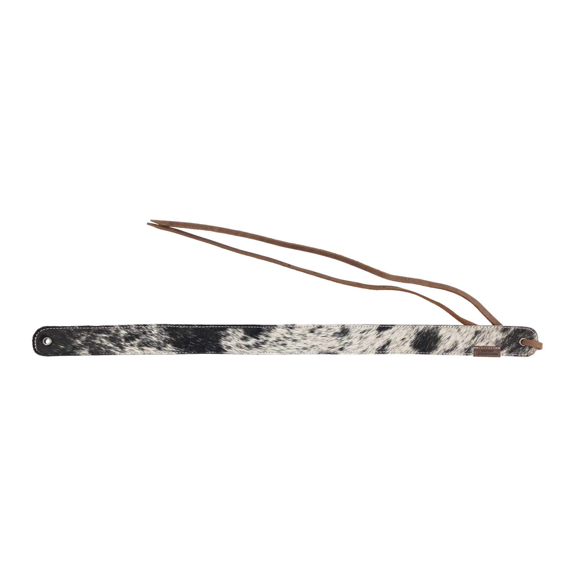 Durable and fashionable Cowboy Hatband from Western Leather Works, crafted using Hair-On-Hide Full Grain Leather. This adjustable hatband for cowboy hats is a perfect addition for rodeo style lovers, showcasing small batch production techniques with hand cut, hand sewn, and fire branded finishes by artisans from La Antigua Guatemala.