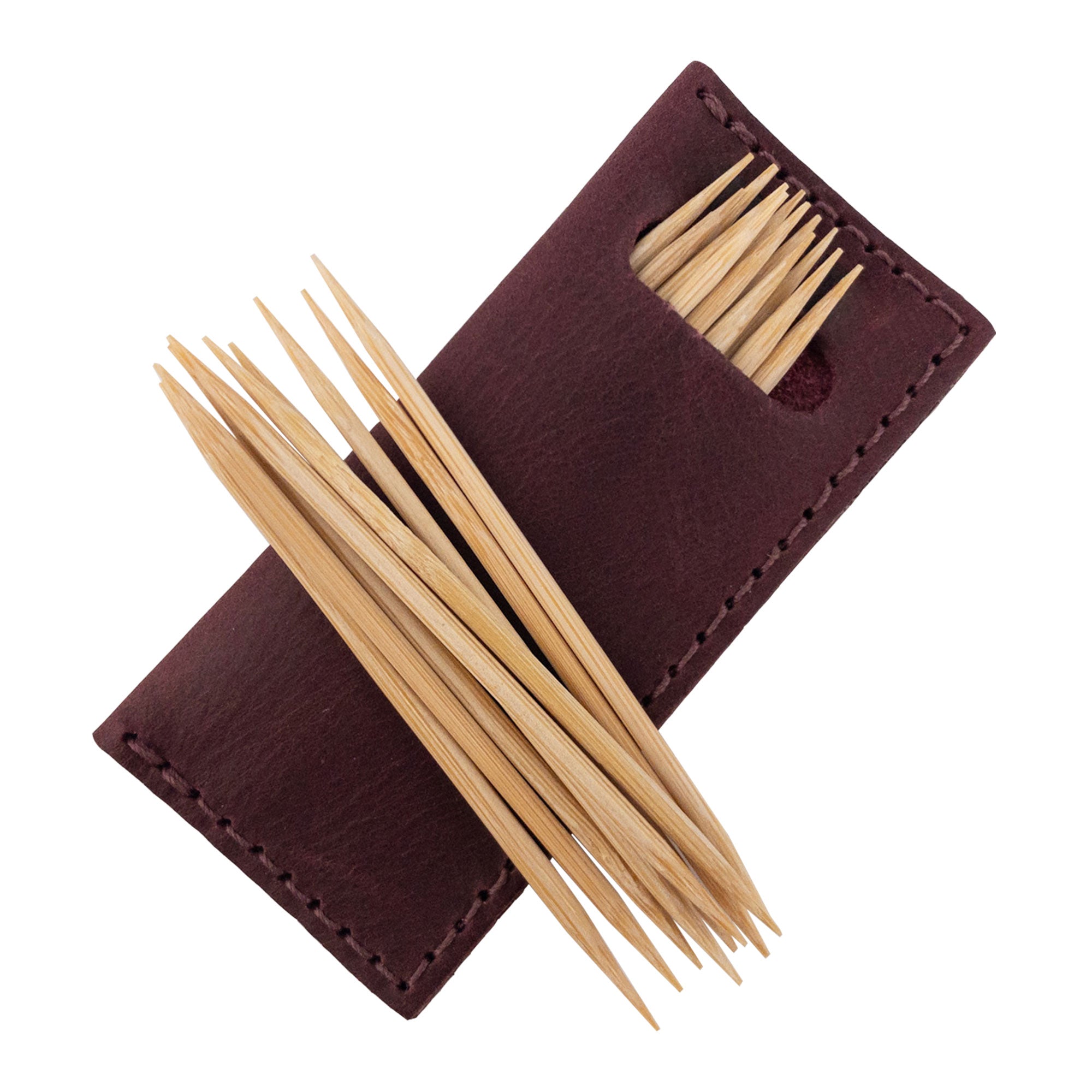 Hide & Drink Tooth Pick Case (4 Pack) showcasing a dark leather variety used for toothpick storage. Set of 4 Tooth Pick Cases, Cooking Accessories, Full Grain Leather, StockyardX, Small Batch Production, Hand Cut, Hand Sewn, Fire Branded, Artisan, Handmade in La Antigua Guatemala & Oaxaca Mexico.