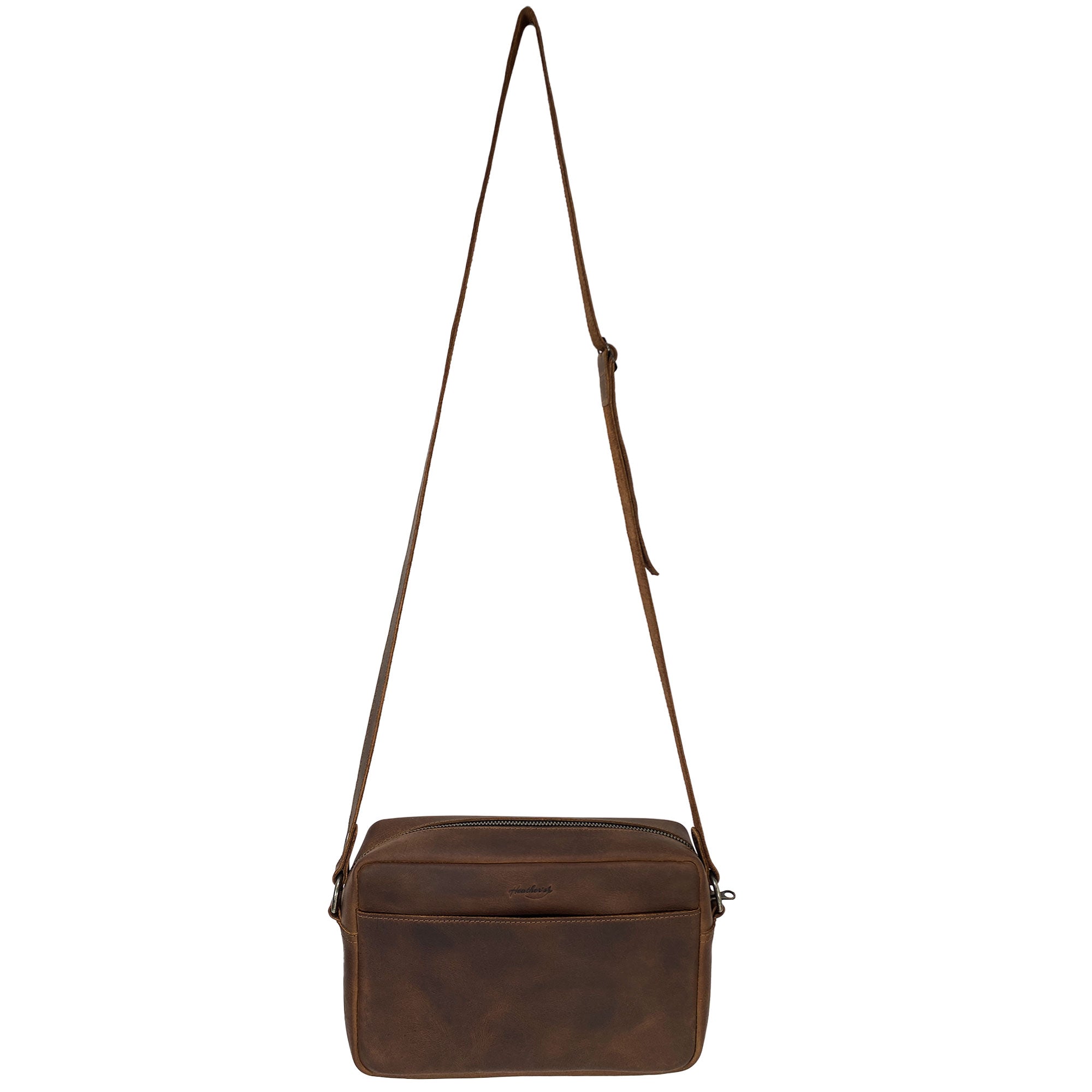 Side view of Heather's Rectangular Crossbody Bag, featuring an adjustable strap, ideal for those who appreciate a stylish shoulder bag for travel and everyday use. Squared Crossbody Bag - Stylish Shoulder Bag for Everyday Use or Travel, Full Grain Leather, StockyardX, Small Batch Production, Hand Cut, Hand Sewn, Fire Branded, Artisan, Handmade in La Antigua Guatemala & Oaxaca Mexico.