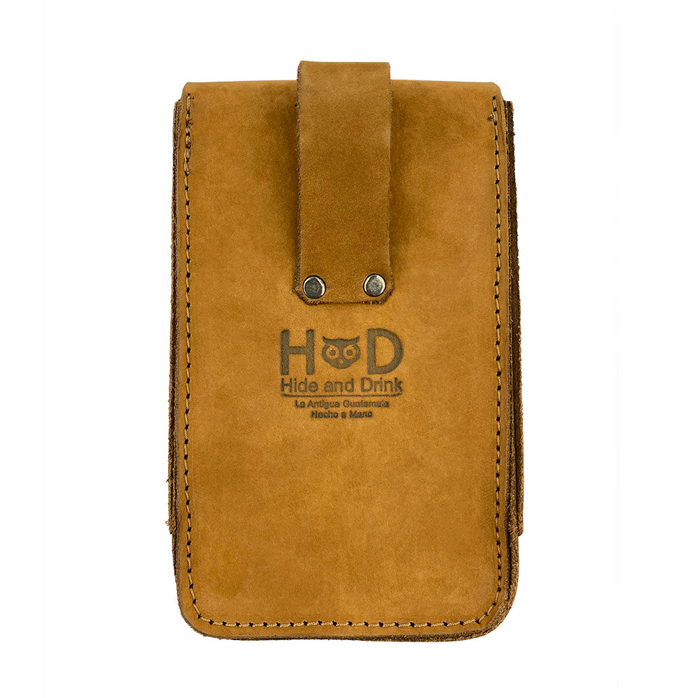 Tan Bartender Fanny Pack by Hide & Drink featuring the brand’s logo, showcasing its unique artisan design. This fanny pack serves as a corkscrew holster and tool pouch, hand cut and sewn from thick full grain leather in La Antigua Guatemala.