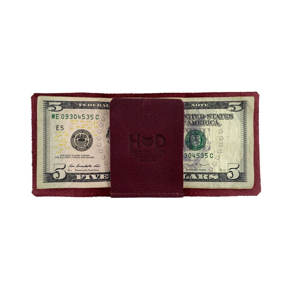 A vibrant image of the Hide & Drink Minimalist Wallet Bills Only, portraying its style and durability in Full Grain Leather. This Ultra Minimalist Wallet is designed for those seeking a reliable cash organizer with the touch of artisan craftsmanship.