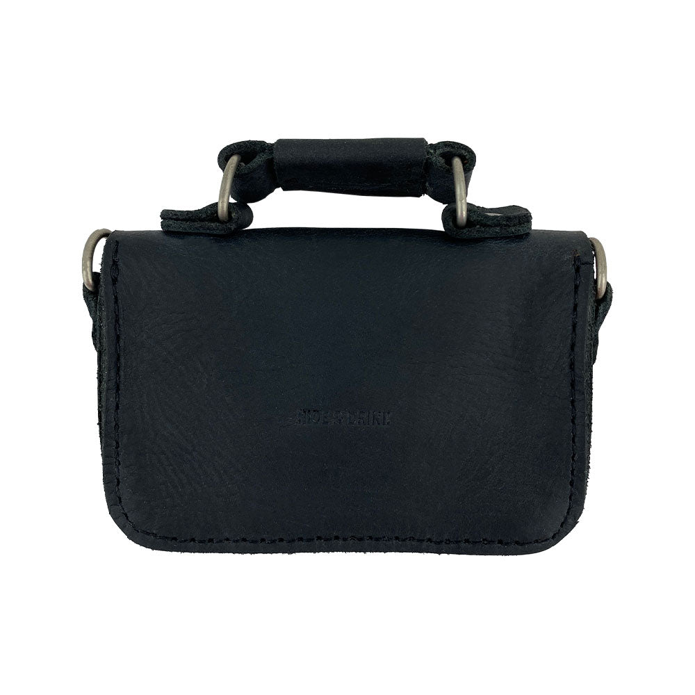 Back view of Hide & Drink's Card Holder Briefcase Style, showcasing the durable black leather of the Mini Briefcase Card Holder. This artisan-crafted case, made from Full Grain Leather, is designed to hold up to 10 cards and folded bills, perfect as a cash organizer.
