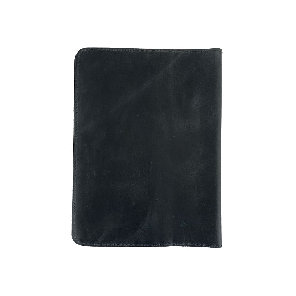 Back of the black Full Grain Leather Journal Cover for Moleskine Cahier XL (7.5 x 9.75 in.) by Hide & Drink, showing the quality craftsmanship and durable construction. This artisan made case is perfect for those seeking a blend of elegance and functionality.