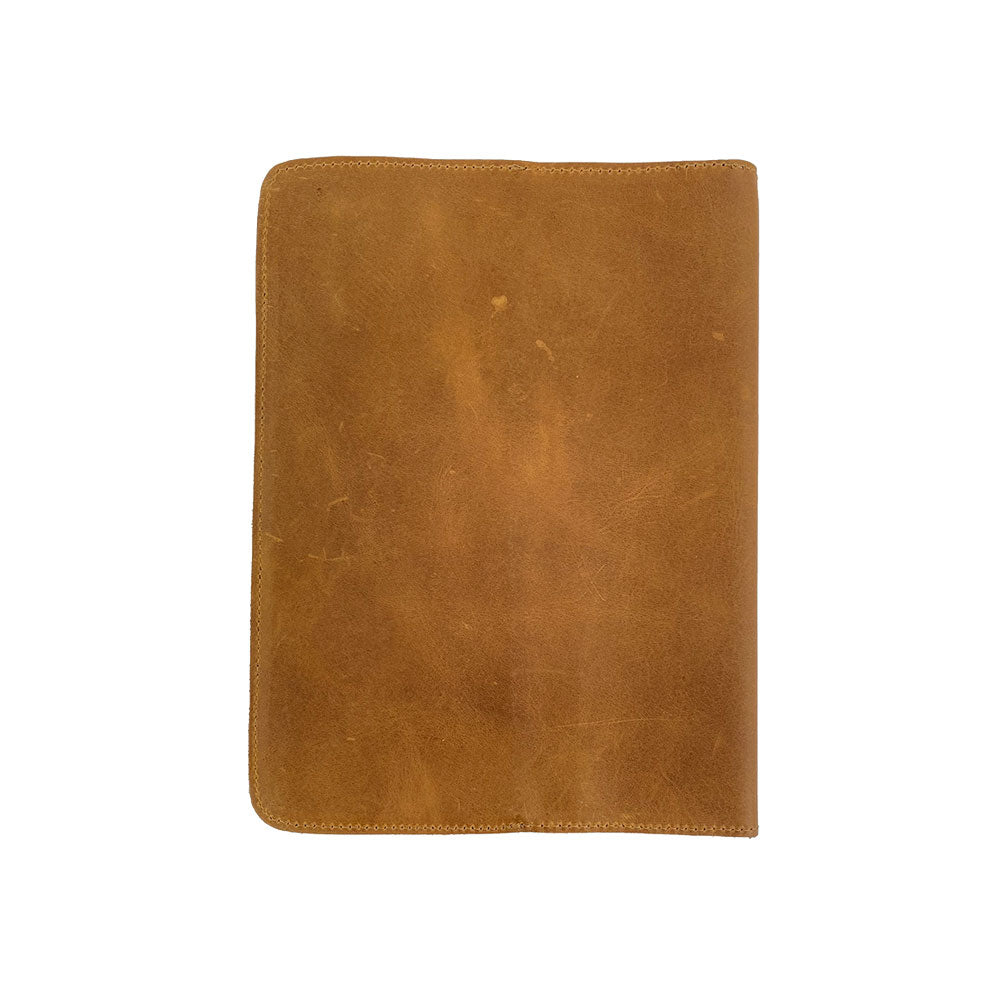 Front view of the eye-catching patchwork leather Full Grain Leather Journal Cover for Moleskine Cahier XL (7.5 x 9.75 in.) by Hide & Drink, featuring vibrant design and durable construction. Artfully crafted for individual style.