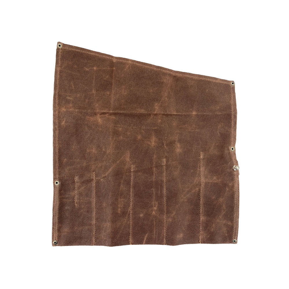 The Large Tool Roll by Hide & Drink, designed for effortless organization. This Portable Carry-On Pouch incorporates 6 slots, perfect for woodworking tools. Made from waxed canvas and full grain leather variations, this artisan item exemplifies dedication to hand-cut and hand-sewn craftsmanship, handmade in La Antigua Guatemala & Oaxaca Mexico.