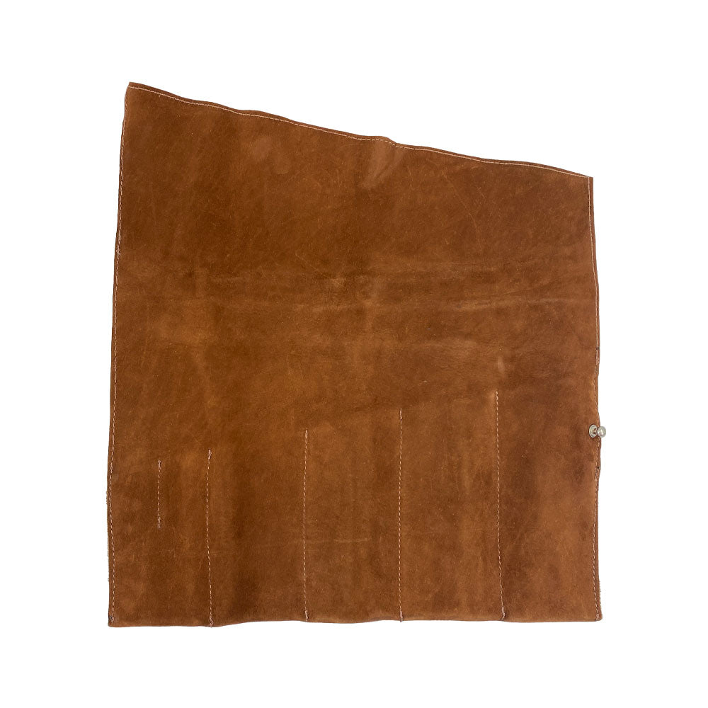 A beautifully presented Large Tool Roll from Hide & Drink featuring a must-have design. This Portable Carry-On Pouch offers 6 slots for efficient woodworking tools management. Constructed from durable waxed canvas and full grain leather variations, this small batch artisan product is hand cut and sewn, showcasing the quality of handmade craftsmanship in La Antigua Guatemala & Oaxaca Mexico.