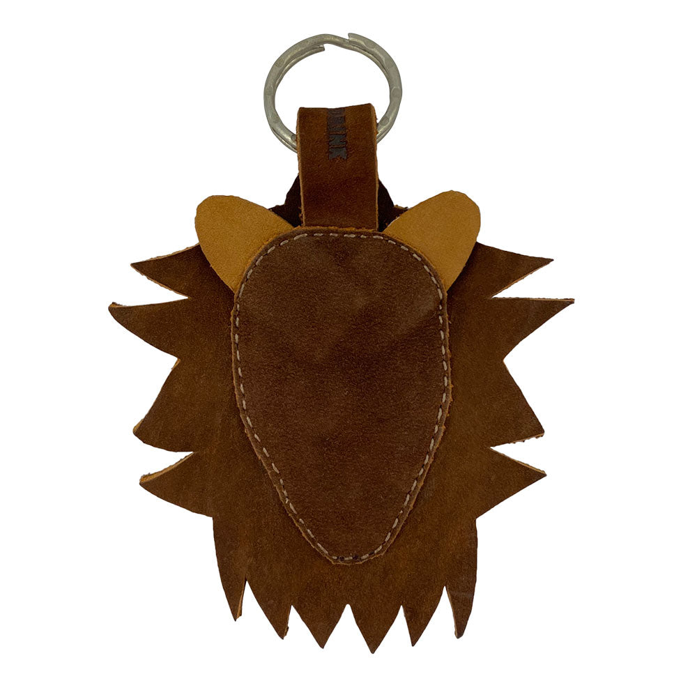 Back view of the Lion Keychain by Hide & Drink, showcasing the soft suede leather with distinct cut shapes. This keychain serves as a durable key ring holder, made through small batch production in La Antigua Guatemala & Oaxaca Mexico, ideal for astrology enthusiasts.