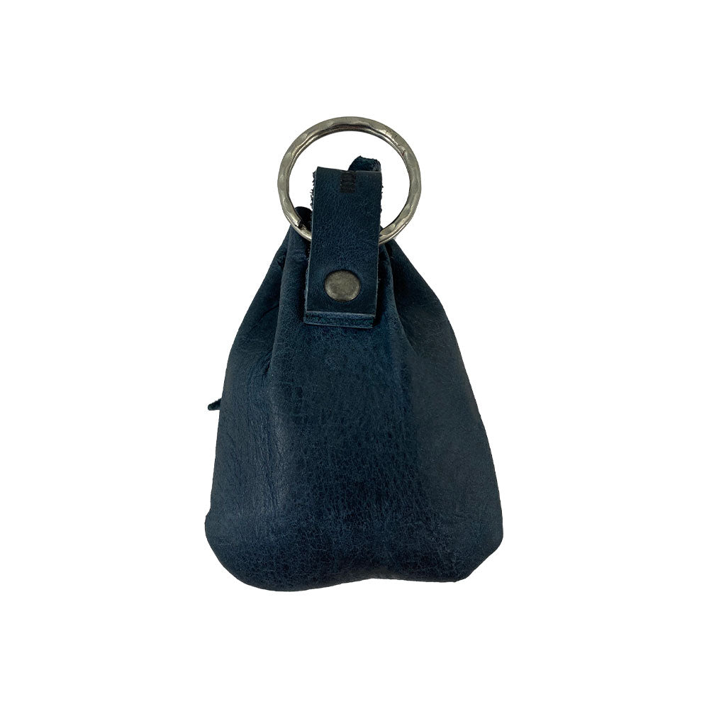 Back view of the Mini Medieval Pouch Keychain by Hide & Drink, showcasing its sturdy keyring. This tiny bag with keyring is made from premium full grain leather, perfect as a coin organizer or pouch, handmade through small batch production in La Antigua Guatemala.