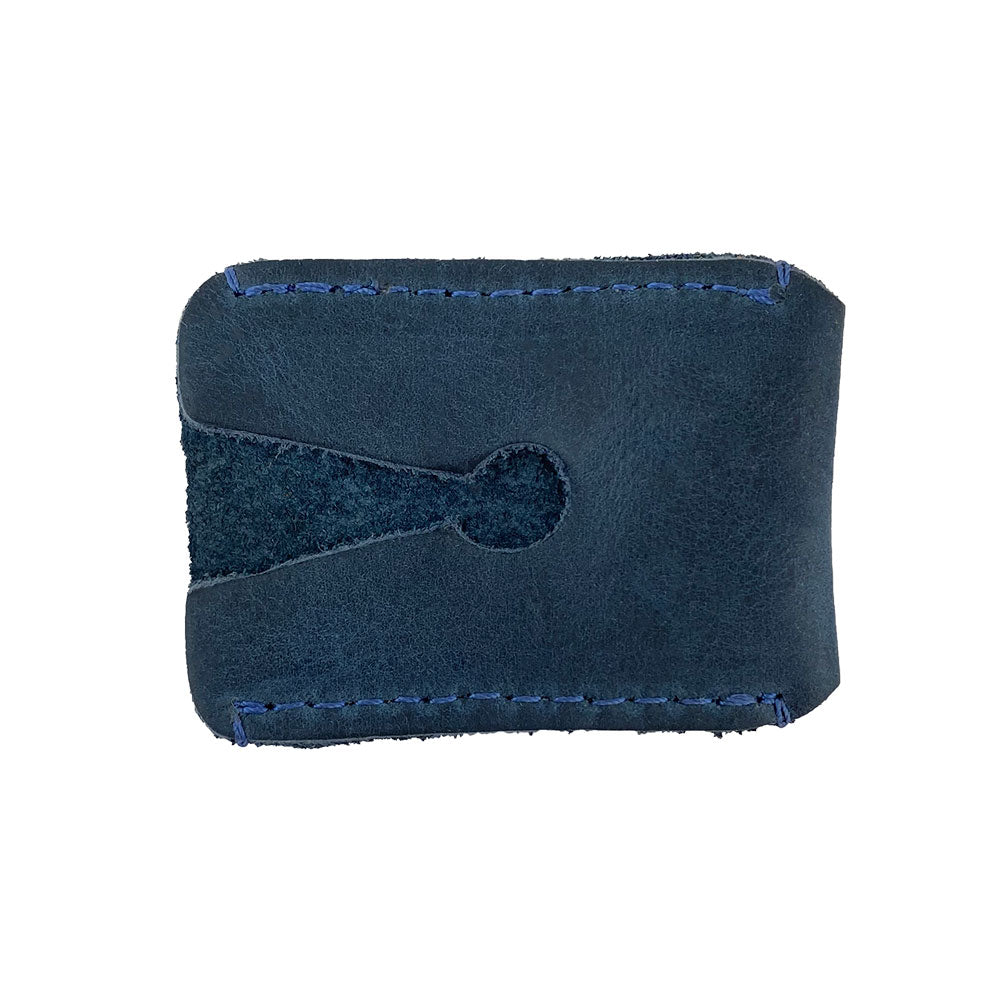 Top view of a Razor Head Cover by Hide & Drink crafted from full grain leather, designed for double edge safety razors, featuring fine stitching and a hole for easy handling. This shaving travel cover is perfect for protecting your razor head while embodying small batch production and artisan craftsmanship from La Antigua Guatemala.