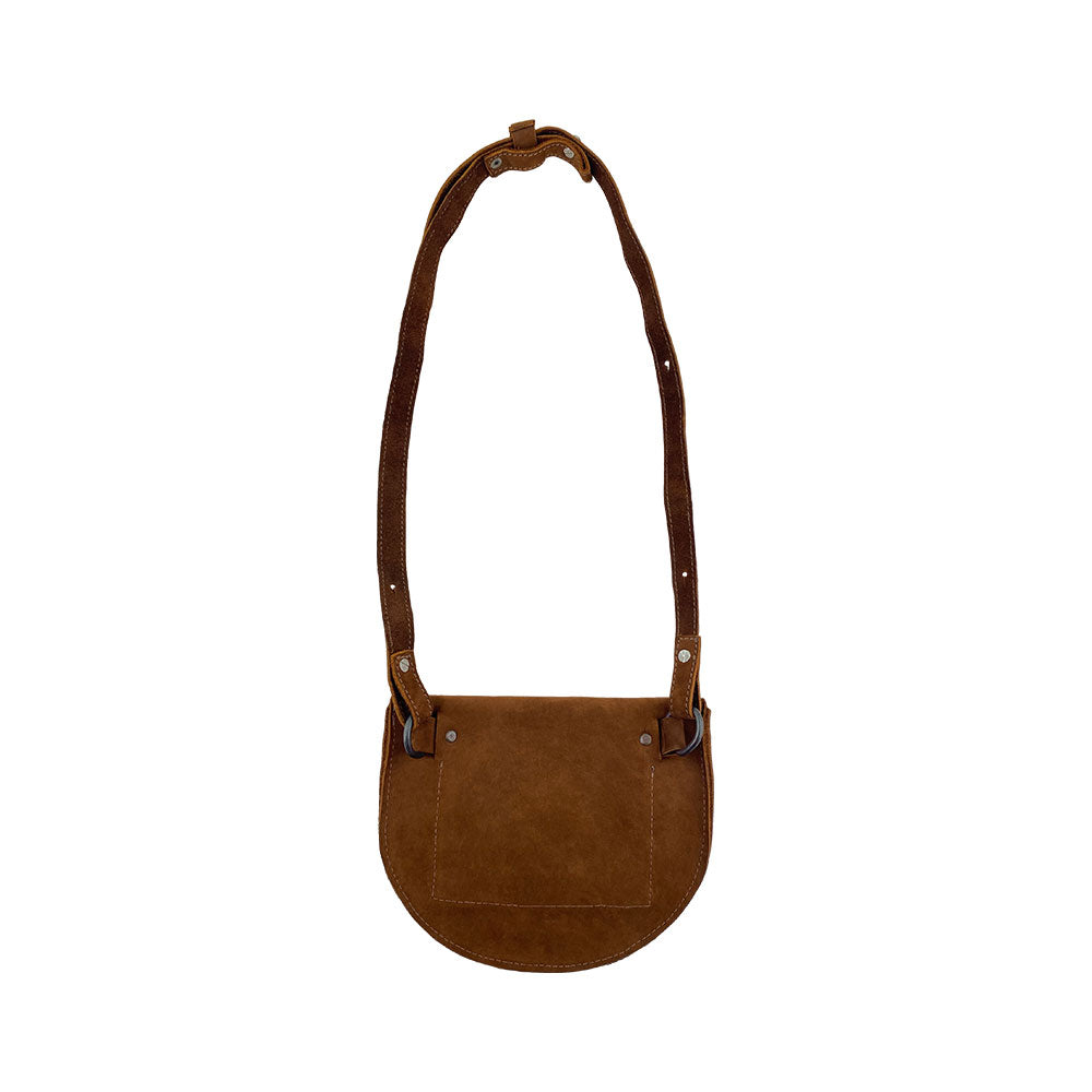 Back view of the tan Hip and Shoulder Bag by Hide & Drink, showcasing its Full Grain Leather and artisan craftsmanship. This bag embodies Small Batch Production through hand cut and hand sewn artistry. Handmade in La Antigua Guatemala & Oaxaca Mexico.