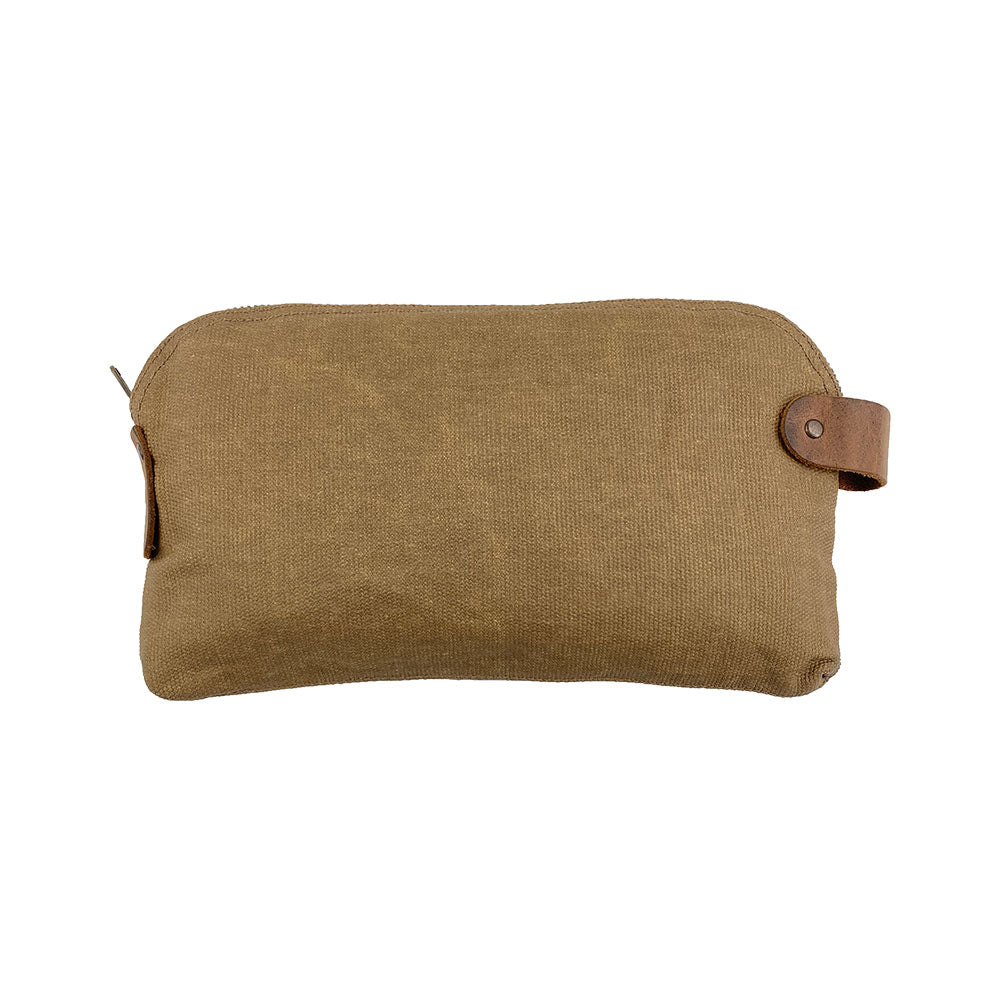 Dopp Kit Utility Bag by Hide & Drink featuring a robust and stylish design ideal for travel. This artisan Dopp Kit Utility Bag is made from full grain leather, showcasing artisan skills through hand cut and hand sewn techniques in small batch production, handmade in La Antigua Guatemala & Oaxaca Mexico.