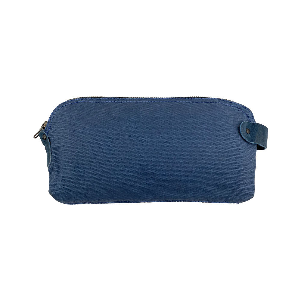 Dopp Kit Utility Bag by Hide & Drink illustrating its elegant construction for practical purposes. This artisan Dopp Kit Utility Bag is crafted from full grain leather, combining quality hand cut and hand sewn techniques in small batch production, handmade in La Antigua Guatemala & Oaxaca Mexico.