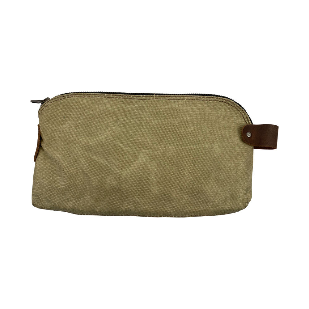 Dopp Kit Utility Bag by Hide & Drink showcasing rustic charm with capabilities for everyday use. This large rustic all-purpose Dopp Kit Utility Bag is crafted from full grain leather with emphasis on hand cut and hand sewn aspects highlighting artisan craftsmanship, handmade in La Antigua Guatemala & Oaxaca Mexico.