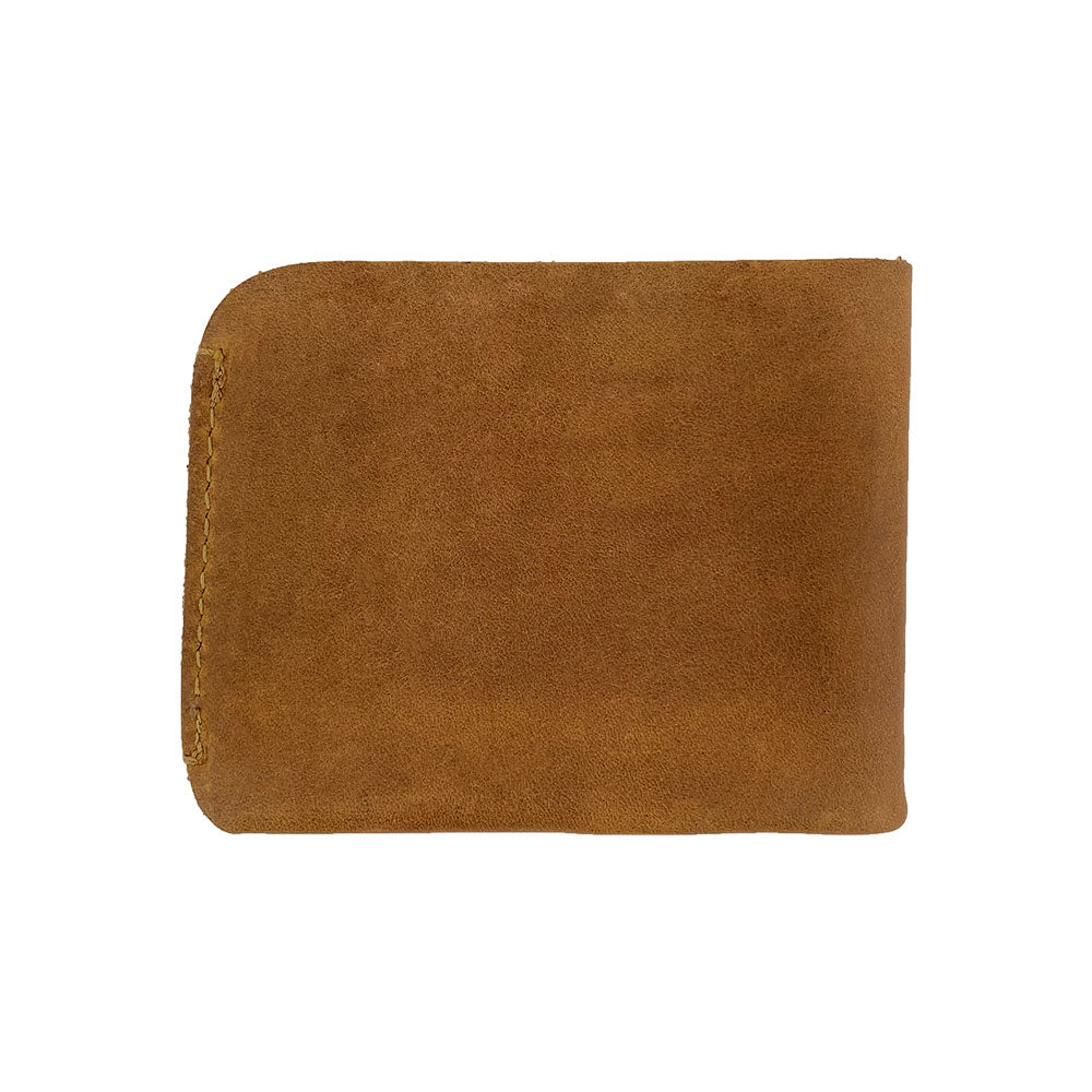 Side view of the Hide & Drink Minimal Wallet, showcasing its rich texture in dark brown Full Grain Leather. This Classic Slimfold Wallet acts as a stylish Card Organizer Holder and Travel Accessory made through Small Batch Production methods by artisans in La Antigua Guatemala & Oaxaca Mexico.