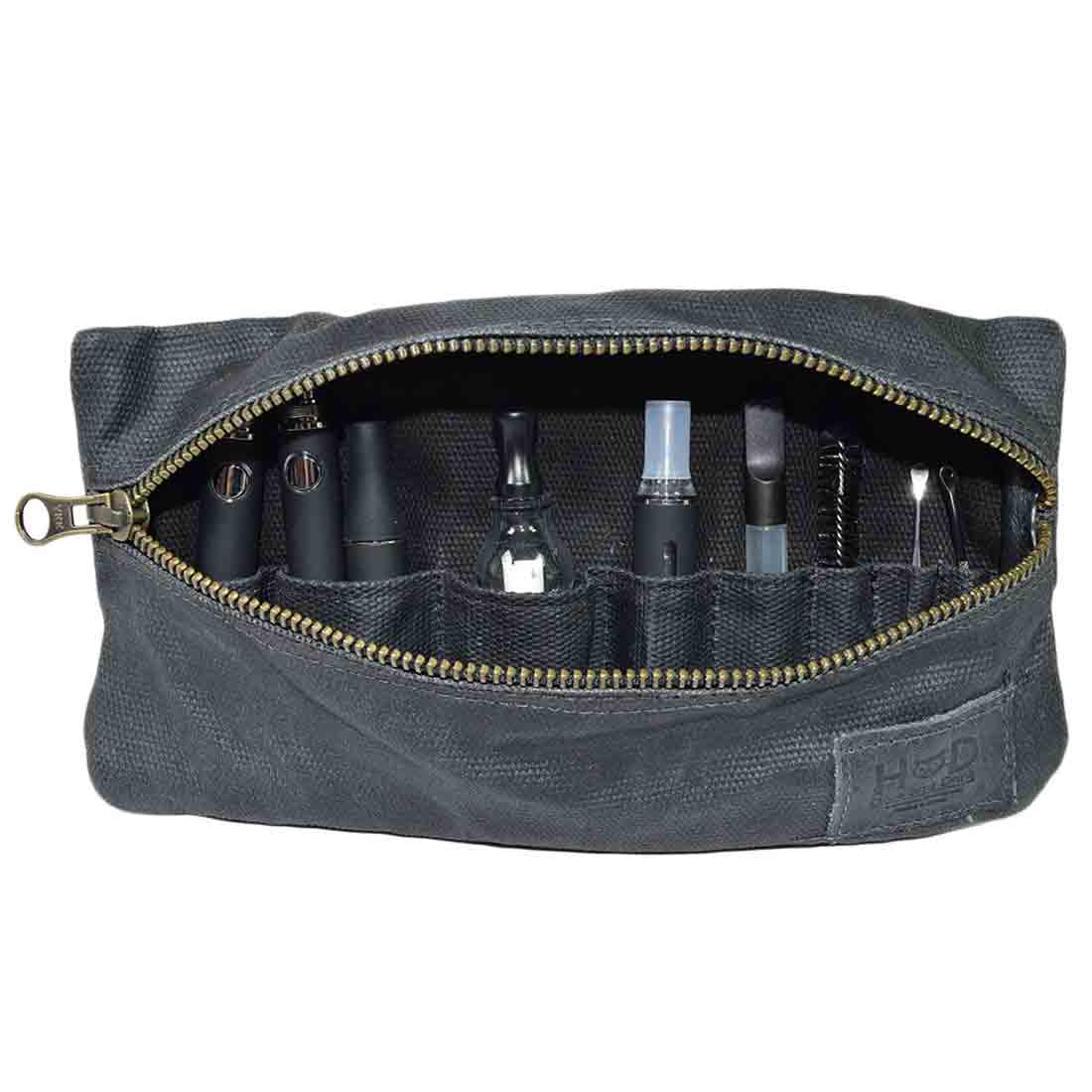 The black Hide & Drink Vape Pen Case (Accessories not included) provides concealment for vaping tools within a chic design. A reliable choice for a Pen Accessories Kit Pouch Holder emphasizing secure fit. G Pen Soft Travel Bag Handmade from Waxed Canvas, Full Grain Leather, StockyardX, Small Batch Production, Hand Cut, Hand Sewn, Fire Branded, Artisan, Handmade in La Antigua Guatemala & Oaxaca Mexico.