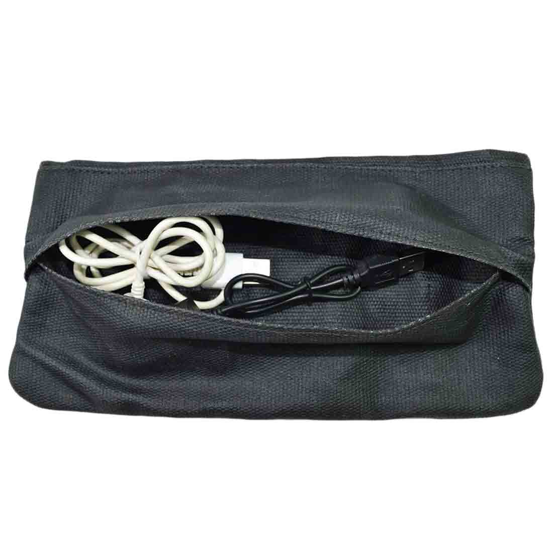 Interior view of the black Hide & Drink Vape Pen Case (Accessories not included) showcasing its capacity for cable storage. Perfect as a Pen Accessories Kit Pouch Holder with secure fit. G Pen Soft Travel Bag Handmade from Waxed Canvas, Full Grain Leather, StockyardX, Small Batch Production, Hand Cut, Hand Sewn, Fire Branded, Artisan, Handmade in La Antigua Guatemala & Oaxaca Mexico.