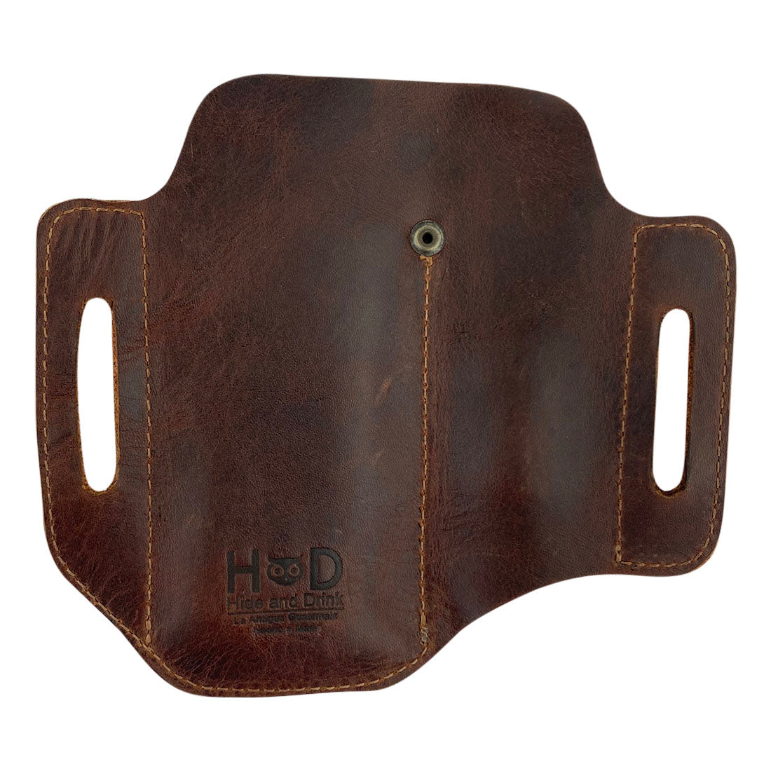 The reverse side of the Urban Tactical Tool Holster by Hide & Drink, highlighting its sturdy design and detailing. This Urban Tactical Tool Holster - Durable Accessory for Carrying Tools with Easy Belt Attachment - Great for Multi-Tool, Pliers, Flashlight, reflects exceptional artisan quality, handmade in La Antigua Guatemala & Oaxaca Mexico.
