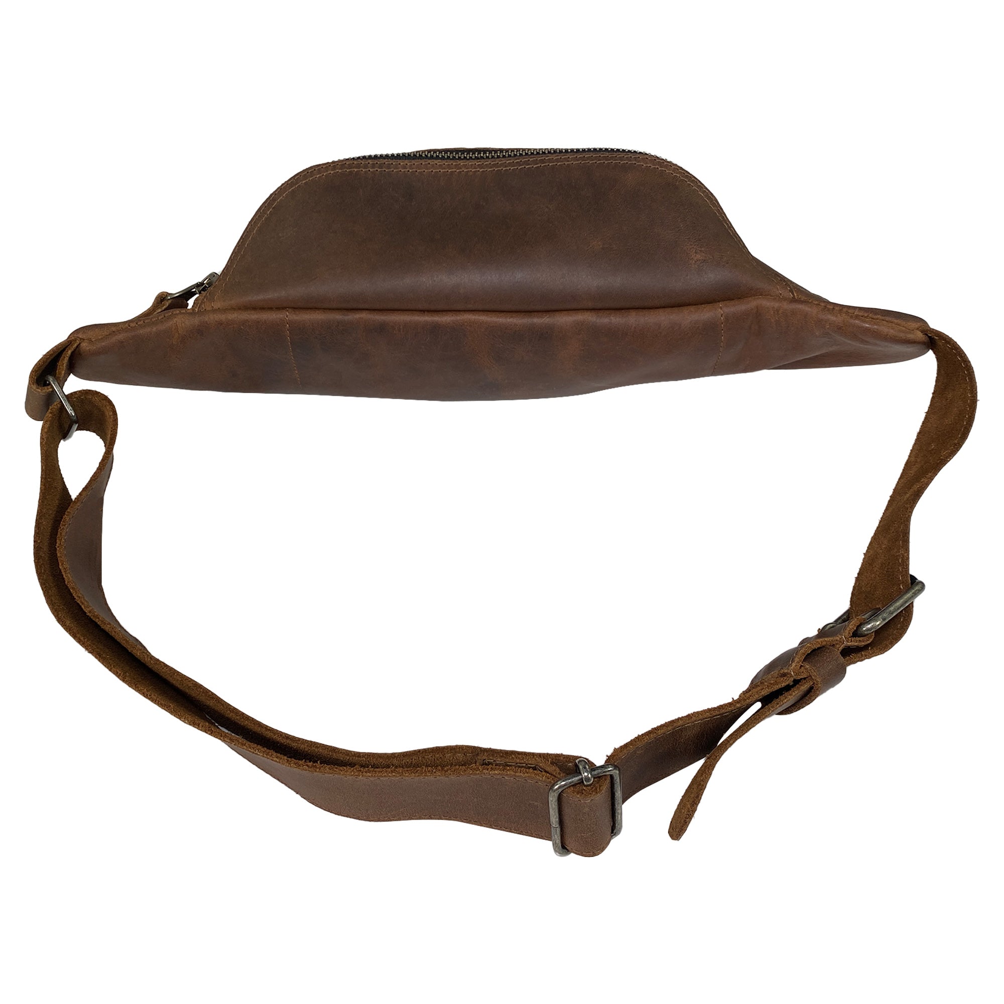 Top view of the Zippered Fanny Pack by Leather Nomad, handmade from full grain leather. This stylish waist bag offers practical storage for money and phone during travels, showcasing artisanal craftsmanship through small batch production, hand cut, and hand sewn techniques from La Antigua Guatemala.